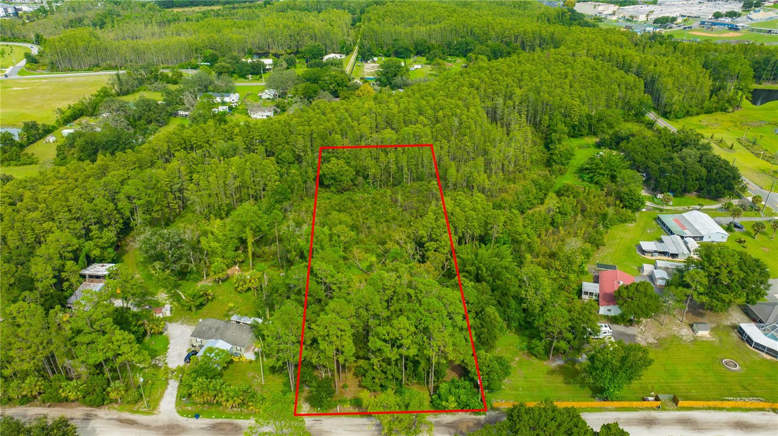 We have the Boundary and Wetland Delineation surveys. Vacant Land Lot for Sale in Land O' Lakes, FL - No HOA - No CDD - Backs Up to Conservation Area, no development behind the property. 

This spacious, fenced property offers the perfect blend of peace, privacy, and convenience.

Utilities are already in place from a previous, older mobile home that was removed by the prior owners.
- Water well
- Septic tank  
- Above-ground electric service – ready for hookup

Prime Location: 
- Tucked just off Highway 41 with quick access to main roads  
- Minutes from Publix, dining, and daily essentials  
- Enjoy the serenity of backing up to a conservation wetland area – no rear neighbors, just nature!

No HOA or CDD!
- Bring your boats, RVs, and toys  

Don’t miss your chance to own this unique slice of Land O’ Lakes. Schedule a showing today!