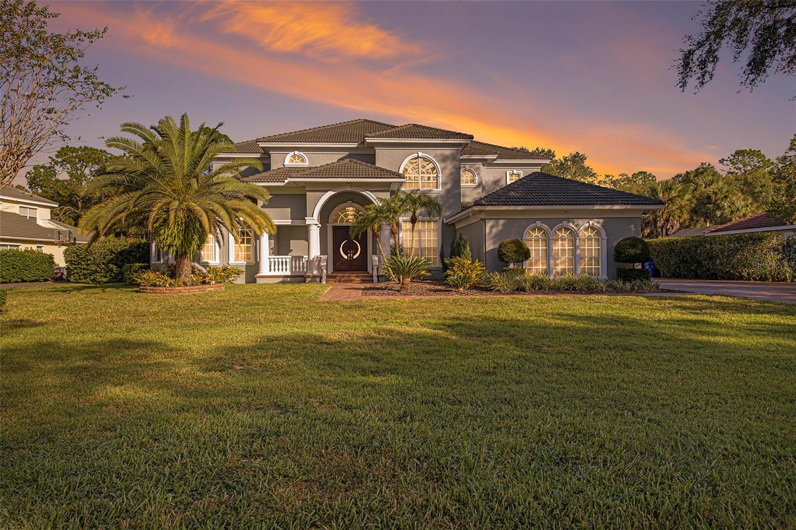 Accepting Back up offers! Welcome to this meticulously upgraded 4-bedroom, 5.5-bathroom, 5,300+ sqft custom home, featuring over $290,000 in luxurious upgrades. This Gorgeous home is located in an exclusive community "The Reserve" which is 24-hour guard-gated. This Amazing property offers an oversized lot with conservation land, ensuring privacy and tranquility, sitting on almost an acre with plenty of space to entertain.
As you approach, the home's curb appeal is enhanced by new and sealed pavers leading to the entrance. Inside, the main living areas are adorned with elegant porcelain tile. The Custom built kitchen is every chef's dream kitchen with a gas Wolf stove, built in stainless steel new appliances, a wine fridge, and a spacious discreetly tucked behind hidden pantry, and marble countertops.
The master bedroom offers the convenience of his and her closets, and the open layout is accentuated by two staircases providing access to the second floor. Recent upgrades include $20,000 spent on the AC units just two years ago, ensuring optimal comfort.
The outdoor space is a haven of relaxation and entertainment, featuring a lap-size pool, spa, and an outdoor shower. Additionally, a playhouse and playground on the property make it a perfect retreat for everyone. The in-law suite has its own private access from the outside to turn into a private space for anything to a guest bedroom to an additional work space. This room can easily be connected back to the main house to be accessible again. The upstairs was converted to an extra large bonus room for entertaining, which leads to the over sized balcony looking over the oasis of your private retreat in your backyard with the Grand pool and spa. This wall can be easily be put back up to make it a 5th bedroom again.This home embodies luxury, comfort, and the joy of coming home after a hard day's work. Don't miss the opportunity to make it your own! This amazing luxury style custom build home is conveniently located near major shopping malls, restaurants, hospitals, and the airport.