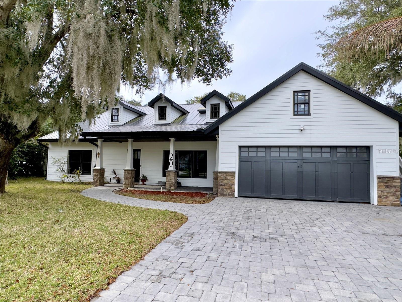 Welcome to 20 Oakdale Street, an exceptional waterfront luxury residence in the highly sought-after Town of Windermere with direct access to Lake Down and the Butler Chain of Lakes offering an ideal blend of elegance, privacy, and Florida lifestyle, this beautiful home is perfectly positioned to enjoy the area's charming small-town atmosphere while remaining just minutes from world-class dining, shopping, golf, and attractions * Incredible backyard * Summer Kitchen with Pizza Oven * Firepit with Stone Seating * Boathouse * Viking 6 Burner Gas Cooktop * Viking Fridge * Built in 2004 * 2 Suites on 1st Floor * Step inside to discover spacious living areas filled with natural light, soaring ceilings, and thoughtfully designed spaces perfect for both everyday living and entertaining. The well-appointed kitchen flows seamlessly into inviting gathering spaces, while the generous bedrooms provide comfort and privacy for family and guests. * Outside, enjoy your own private retreat with beautifully landscaped grounds, ample outdoor living space, and the opportunity to experience everything that makes Windermere one of Central Florida's most desirable communities. Whether relaxing by the pool, hosting friends, or taking advantage of nearby lakes and recreation, this home offers the lifestyle you've been searching for. * Located within close proximity to top-rated schools, renowned golf courses, the Butler Chain of Lakes, and just a short drive to downtown Orlando and major theme parks, this is a rare opportunity to own a premier property in one of Florida's most prestigious addresses.