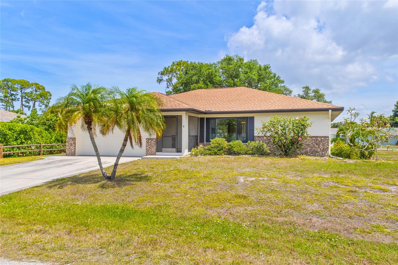 Welcome to your charming Florida getaway on a spacious corner lot in beautiful South Venice. This inviting 2-bedroom, 2-bath home offers both a living room and a family room, along with a roomy lanai featuring pocket sliding doors—perfect for relaxing or entertaining. An exterior shed/workshop with electricity adds great versatility for hobbies or extra storage, and with no rear neighbors, you’ll enjoy plenty of privacy. Recent updates include a brand-new AC, newer roof, updated electrical, newer water heater, and a kitchen with granite countertops and an RO system. As a South Venice resident, you can also take advantage of the community ferry and boat ramp with an optional annual membership.