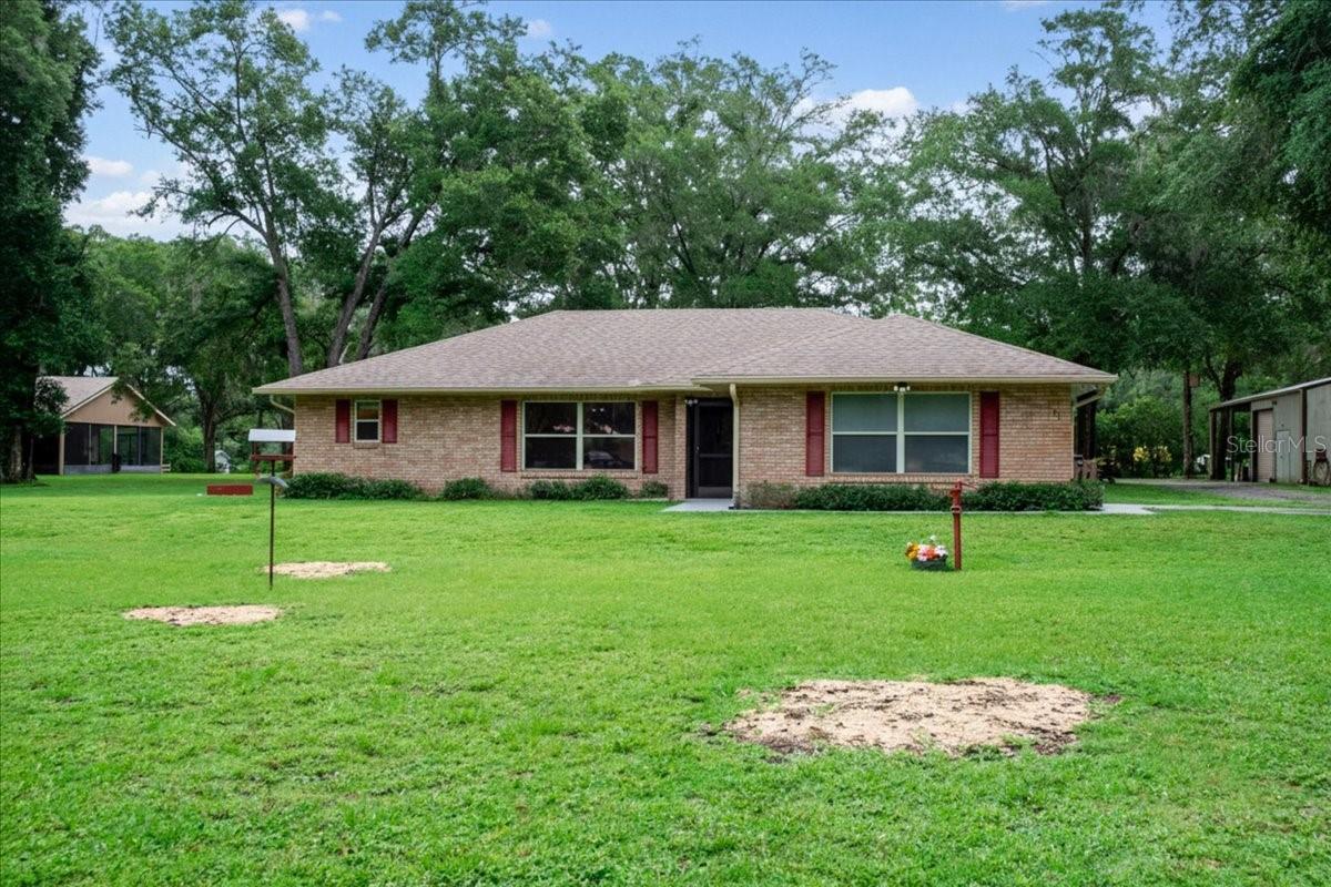 **COMING SOON**Nestled on 2.3 beautiful acres in the “Gem of Florida, " Lake Helen, this unique property offers a spacious main home and separate guest cottage, providing flexibility for multi-generational living, guests, or potential rental opportunities.  The main residence features 3 bedrooms, 2 bathrooms, a 2 car garage, and a relaxing back patio overlooking the expansive yard.
The GUEST COTTAGE includes 1 bedroom, 1 bathroom, a FULL kitchen, and split system air conditioning, creating a comfortable and private living space.  The property is equipped with city water, plus a separate well for irrigation, helping maintain the lush grounds.  Additional features include a workshop with a 30 amp hook up, covered carport for RV, BOAT and other toys.  Recent updates include Main house Roof 2021,  GUEST Cottage roof 2024 and Water Heater 2026 for added peace of mind. 
Enjoy the privacy and space of country-style living and ability to spread out while remaining close to local amenities, shopping, dining, and major roadways (I-4).  This versatile property offers endless possibilities in the very heart of Lake Helen, Florida.  It is truly one of a KIND.
AUDIO VISUAL on the property!!
