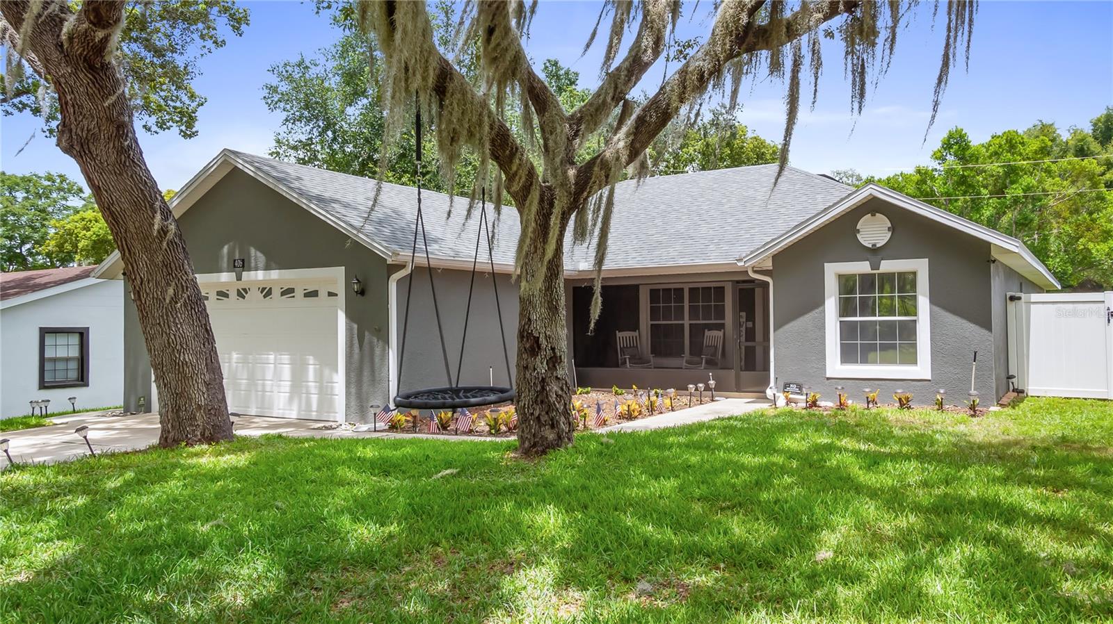 Welcome to your next chapter in the heart of charming Howey-in-the-Hills, where small-town charm, modern updates and freedom from HOA restrictions come together. This beautifully maintained three-bedroom, two-bath home with a versatile office/den offers the flexibility of a potential fourth bedroom and is move-in ready. From the moment you go inside, you'll appreciate the bright, open floor plan designed for everyday living and effortless entertaining. The spacious kitchen is the centerpiece of the home, featuring abundant cabinetry, generous counter space, granite countertops installed in 2022, and seamless flow into the living and dining areas. The primary suite offers a relaxing retreat with dual sinks, granite countertops and plenty of space to unwind. Luxury vinyl plank flooring runs throughout the home, with tile in the wet areas and absolutely no carpet. Go outside and discover a property that's as functional as it is inviting. The fully fenced backyard features dual access gates, making it easy to store a boat, trailer or recreational vehicles. Enjoy Florida living year-round from the screened front porch, screened rear porch and expansive 12-by-30-foot patio. An 8-by-16-foot storage shed provides additional space for tools, hobbies or outdoor equipment. These major updates offer peace of mind such as new roof (June 2026) with transferable warranty, HVAC (2022), water heater (2022), interior and exterior paint (2022), tinted windows for enhanced privacy and energy efficiency. Location is everything, and this home delivers. Just minutes from the Howey boat ramp and the beautiful Harris Chain of Lakes, boating and fishing adventures are always within reach. You'll also enjoy convenient access to Publix, restaurants, shopping, the Florida Turnpike and some of Central Florida's popular destinations. Whether you're looking for room to grow, space for your toys or simply a beautifully updated home without HOA fees, opportunities like this don't come around often. Schedule your private showing today and experience the lifestyle you've been searching for.