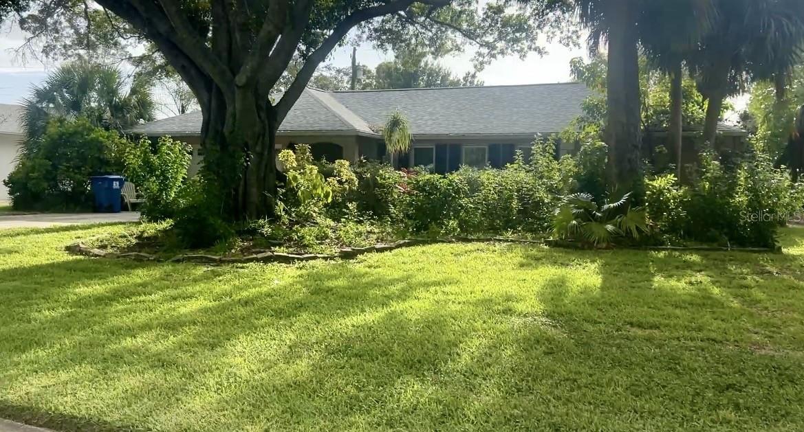 Welcome to this rare 4-bedroom, 3-bath block home in desirable Northeast St. Petersburg. This single-story home offers a functional floor plan with spacious living areas, including an L-shaped living and dining room, plus a separate family room that opens to an updated, modern kitchen. The split bedroom layout is ideal for families. The home's wood-look porcelain floors are beautiful! The generous backyard provides plenty of space to relax, play, or create your own outdoor oasis, while the home's setback from the road offers an expansive, quiet front yard. The back screen porch was enclosed for more living square footage not included in the public records. The roof was replaced in 2022 and all of the appliances are less than 2 years old. The home's pipes have been lined and the seller says there are no plumbing issues. Conveniently located near Denver Park, shopping, dining, downtown St. Petersburg, and the Gulf beaches, this home combines comfort, convenience, and opportunity. Come see all it has to offer!