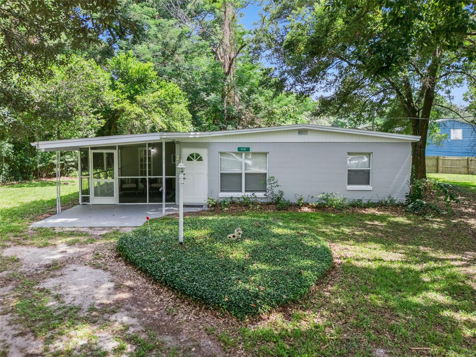 Tucked at the end of a private, shaded cul-de-sac, this 2-bedroom, 1-bath home sits on an oversized .29-acre lot — mature trees, room to grow, and a rare sense of seclusion in central Seminole County. A large screened front porch adds nearly 185 sq ft of usable outdoor living under roof, alongside approximately 874 sq ft of living space (county records reflect 719; buyer to verify). Recent updates include a new roof (2020), granite countertops, fresh paint inside and out, and an inside washer/dryer hookup. Cooling is provided by window/wall units. Well and septic mean no monthly water bill, and there's no HOA and no deed restrictions. Zoned for Wekiva Elementary, Teague Middle, and Lake Brantley High, and minutes from SR-436, SR-434, I-4, Altamonte Mall, and Wekiwa Springs State Park. An incredible opportunity for a first-time buyer or investor. Schedule your showing today!