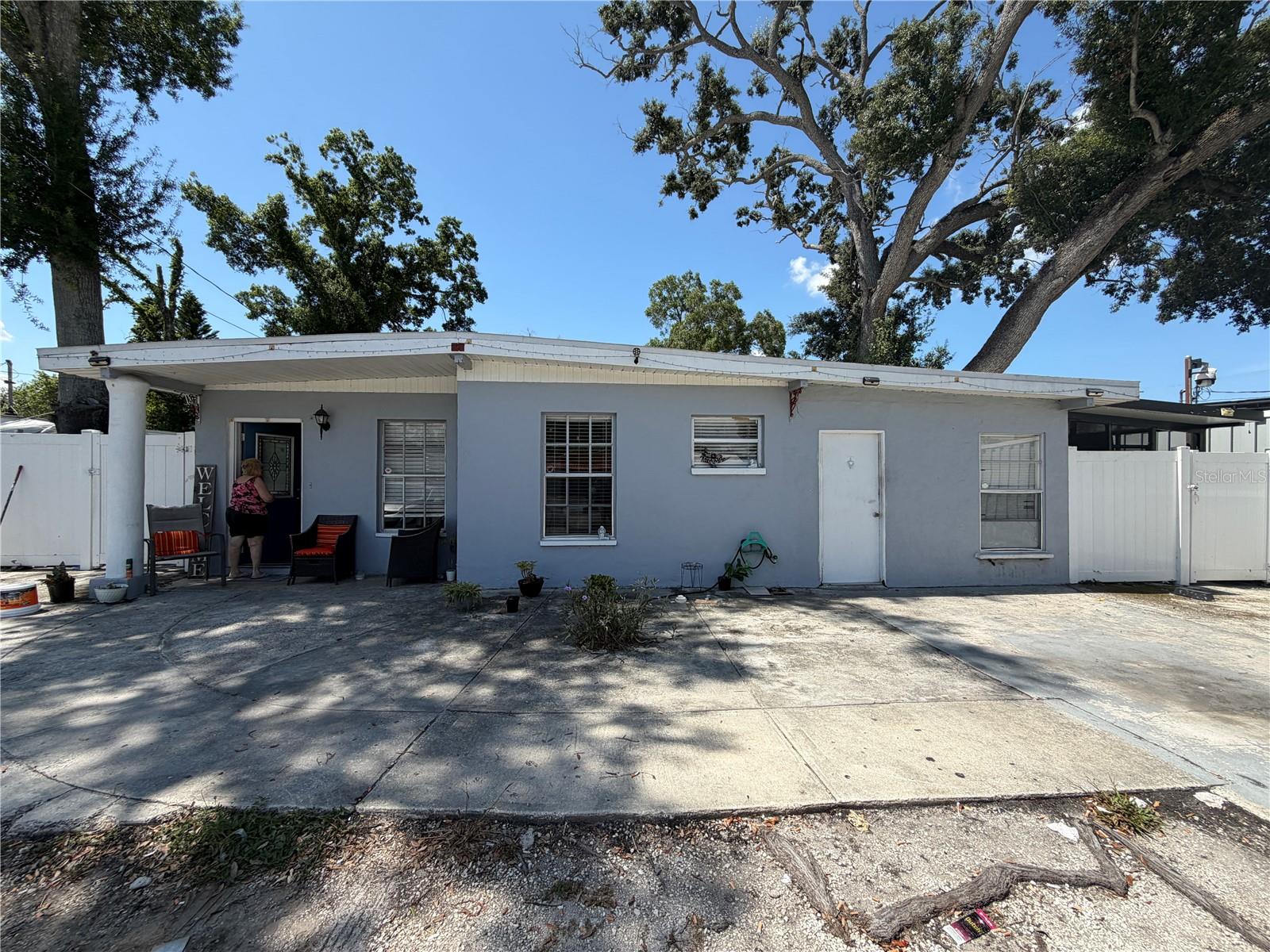 Prime West Tampa Investment Opportunity – 3-Unit Income Property. Looking to add a strong cash-flowing asset to your portfolio? This West Tampa property offers a rare configuration: a single-family home legally set up and functioning as a triplex, all under one electric and water meter, simplifying utilities while maximizing rental potential. The location is unbeatable, just minutes from Tampa International Airport, Downtown Tampa, and Raymond James Stadium, putting tenants close to major employment centers, entertainment, and game-day energy. The property features three units: a 2 bed/1 bath unit with central A/C (approximately 5 years old), a 1 bed/1 bath unit with a window A/C unit, and a studio unit also with a window A/C unit. The property is fully livable in its current condition and generating rental-ready value today, with room to boost returns through cosmetic updates such as fresh paint, flooring, and finishes that could go a long way toward increasing rents and long-term value. The roof was replaced just 2 years ago, offering peace of mind on one of the biggest-ticket items for any investor. As an added bonus, solar panels are already installed on the roof; they are not currently active, and a buyer would need to bring in a solar company to complete the installation and activate the system, but the groundwork is there for a future energy-cost advantage. This is a solid, income-ready opportunity for an investor looking to acquire a multi-unit cash flow property in one of Tampa's most connected corridors, bring your vision for updates and unlock the full upside this property has to give.
