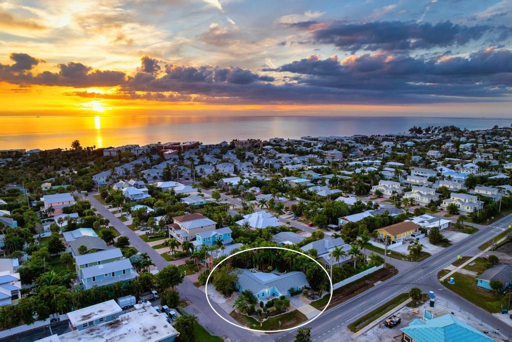 Discover a versatile two-unit property in Holmes Beach offering the flexibility many buyers seek on Anna Maria Island. With a combined total of 5 bedrooms and 4 bathrooms, this property includes two fully turnkey residences: Pool Party South, a 3-bedroom, 2-bath main home, and Pool Party North, a 2-bedroom, 2-bath secondary unit. This configuration is well suited for those looking for a two-unit island home, a vacation property with short-term rental potential, or a second home that can help offset expenses when not in use. Both units feature coastal-inspired updates, including modern tile flooring, granite countertops, stainless steel appliances, newer roofs, and comfortable furnishings. Offered turnkey, the property is ready for immediate enjoyment or rental use. Weekly rentals are permitted, providing owners the flexibility to enjoy the island on their own schedule while generating income when away—an important consideration for buyers seeking short-term rental options on Anna Maria Island. The outdoor living area enhances the relaxed Florida lifestyle with a heated pool and spa, outdoor bar with sink, and multiple areas for dining and lounging. The oversized lot adds a sense of privacy, creating an inviting retreat for both owners and guests. This layout appeals to a variety of uses, including a multi-residence setup, a dual-unit investment property, or a home offering separation between living space and guest accommodations while maintaining rental flexibility. Located just a short walk to the Gulf beaches, as well as nearby dining, shopping, and island amenities, this property captures the ease and charm of Holmes Beach living. For buyers searching for an updated two-unit home with a pool, walkable beach access, and strong rental potential, Pool Party South and Pool Party North provide a compelling blend of lifestyle and opportunity on Anna Maria Island.