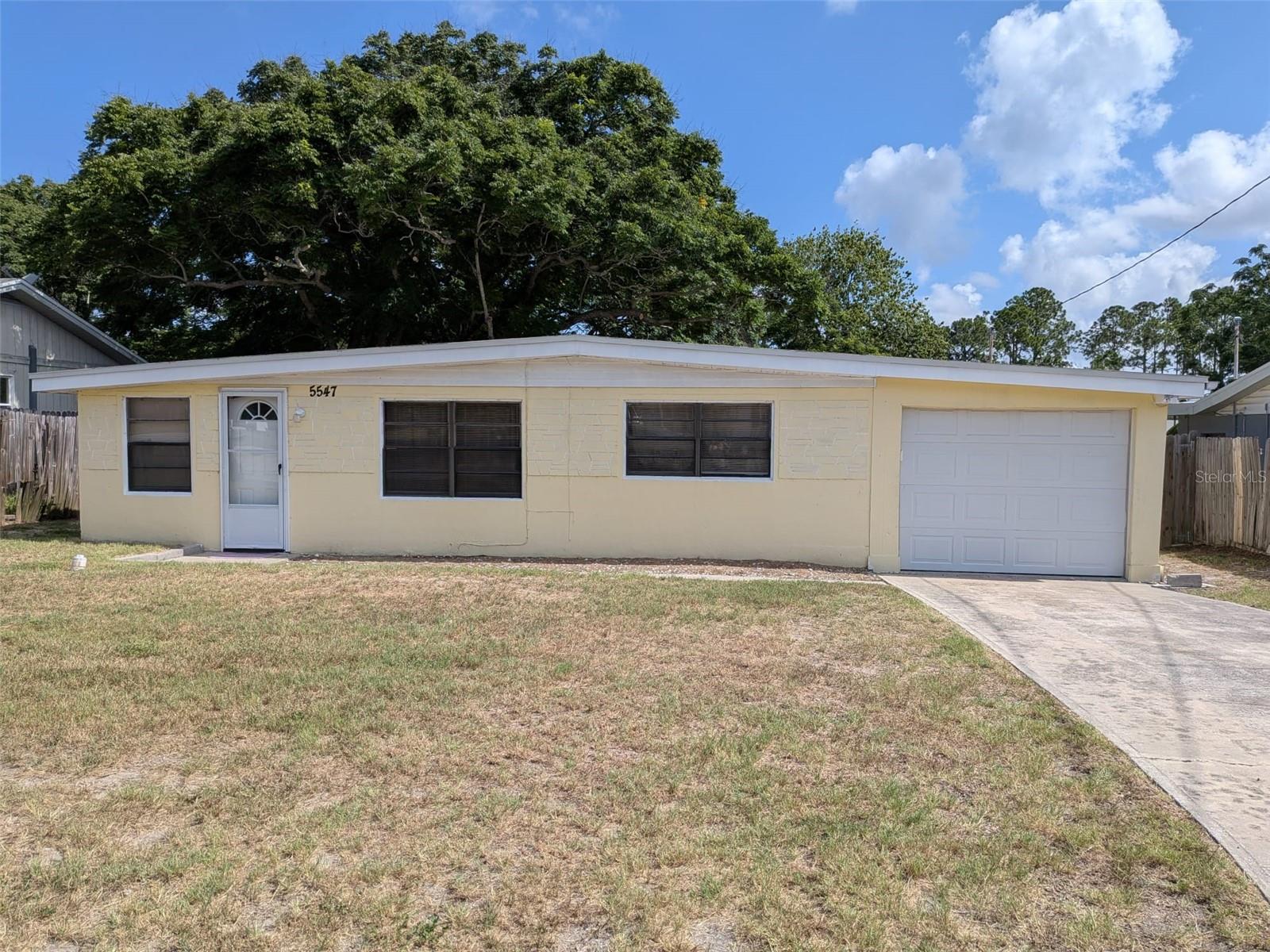 Virtually Staged. Move-In Ready! This inviting 2-bedroom, 2-bathroom home offers the perfect combination of comfort, convenience, and location in a quiet, well-established New Port Richey neighborhood. The home features a spacious, functional floor plan, an attached garage, and a large fenced backyard—perfect for relaxing, entertaining, or enjoying time with your pets.

Ideally located just minutes from shopping, dining, schools, medical facilities, parks, and major highways, you'll also enjoy quick access to Downtown New Port Richey, Sims Park, the Cotee River waterfront, and the beautiful Gulf Coast beaches. Whether you're commuting or looking to enjoy everything the area has to enjoy, this location is hard to beat.

Pet-friendly and available for immediate occupancy, this home is ready for you to move in and make it your own. Don't miss this exceptional rental opportunity—schedule your private showing today!