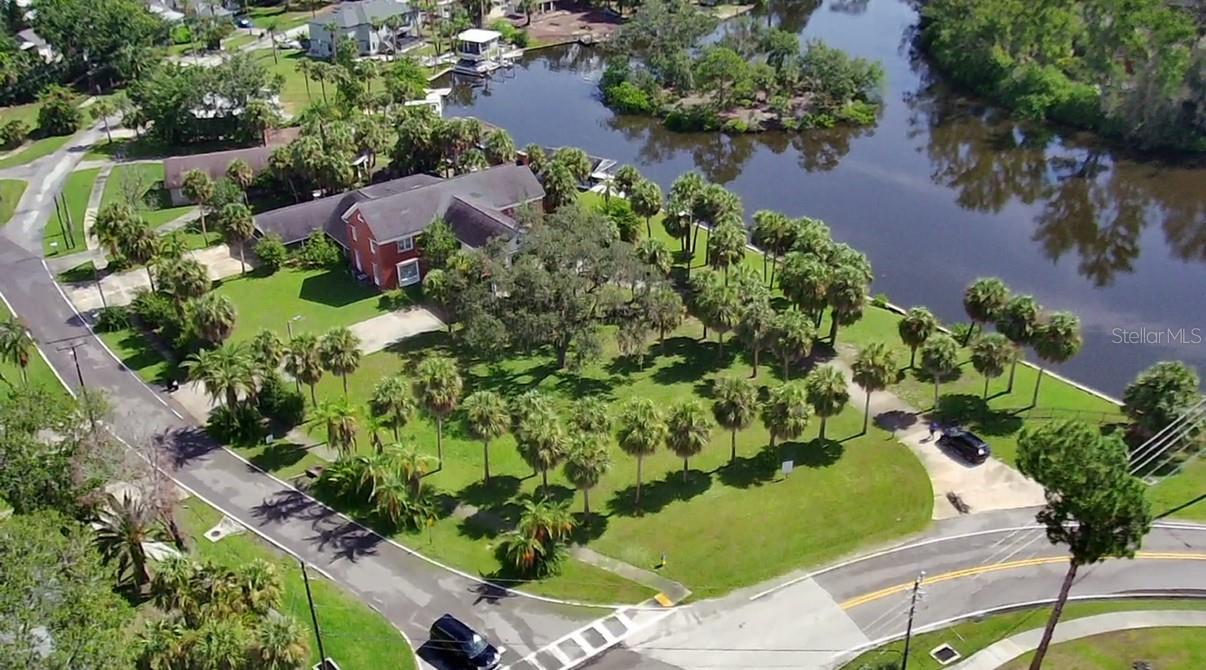 Amazing location to build your dream home with water views and Gulf access! Bring your boat and enjoy the Salt Life! Oversized parcel (155x182) will give you plenty of room to design and build. Located in central Tarpon Springs and a few blocks from all three schools, both local beaches and downtown. Public underground utilities available. No deed restrictions or HOA.