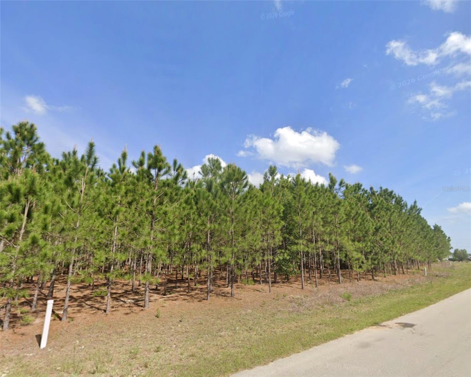 Prime commercial lot: 1.06-acre parcel in Baseline Business Center, commercially zoned B5. Excellent location with high visibility and easy access to major routes — minutes to Ocala and The Villages — ideal for retail, office, medical, light industrial, or mixed-use development. Level site with clear buildable area; utilities available nearby (verify with county). High-visibility, truck-friendly site ideal for regional retail/wholesale, repair & service, vehicle sales, equipment dealers, garden center, contractor yard, truck stop/public parking, light industrial, or mixed-use commercial development.  Strong regional demographics and steady traffic patterns make this a strategic investment or owner-user opportunity. Flexible B5 zoning supports a wide range of commercial uses. Easy site walk and quick due diligence timeline welcome. Call today for more information.