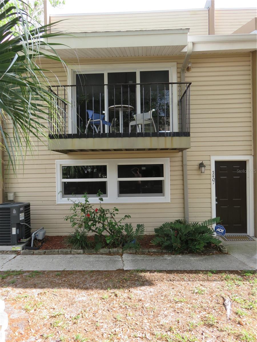 Spacious 2-bedroom, 2-bath end-unit townhome located in the desirable Town ‘N Country area. This well-designed residence offers approximately 1,408 square feet of living space with a unique multi-level floor plan and has been recently remodeled. Updates and upgrades include: Ceilings redone to include lace texturing, New paint throughout, new flooring, new kitchen cabinets and appliances. Bathroom's remodeled: new cabinets flooring and shower. Impact windows and new sliding door installed and new double windows for garage. The first level features an oversized 2-car garage with abundant storage and flexible space for a workshop, gym, or additional storage. The main living area showcases vaulted ceilings, creating a bright and open feel, with sliding glass doors leading to a private balcony. The kitchen includes a breakfast bar and opens to the dining and living areas, making it ideal for entertaining. Both bedrooms feature walk-in closets, and the primary suite includes an en-suite bath. Additional highlights include central A/C, ceiling fans, skylights, and ample storage throughout. Conveniently located near major roadways, including Hillsborough Avenue and the Veterans Expressway, providing easy access to Tampa International Airport, downtown Tampa, and surrounding areas. Close to shopping and dining options such as International Plaza and Bay Street, Midtown Tampa, and local favorites like Pipo's Restaurant and Malambo Grill. Low-maintenance living in a central Tampa location. Furnishings possibly available for tenant if requested.