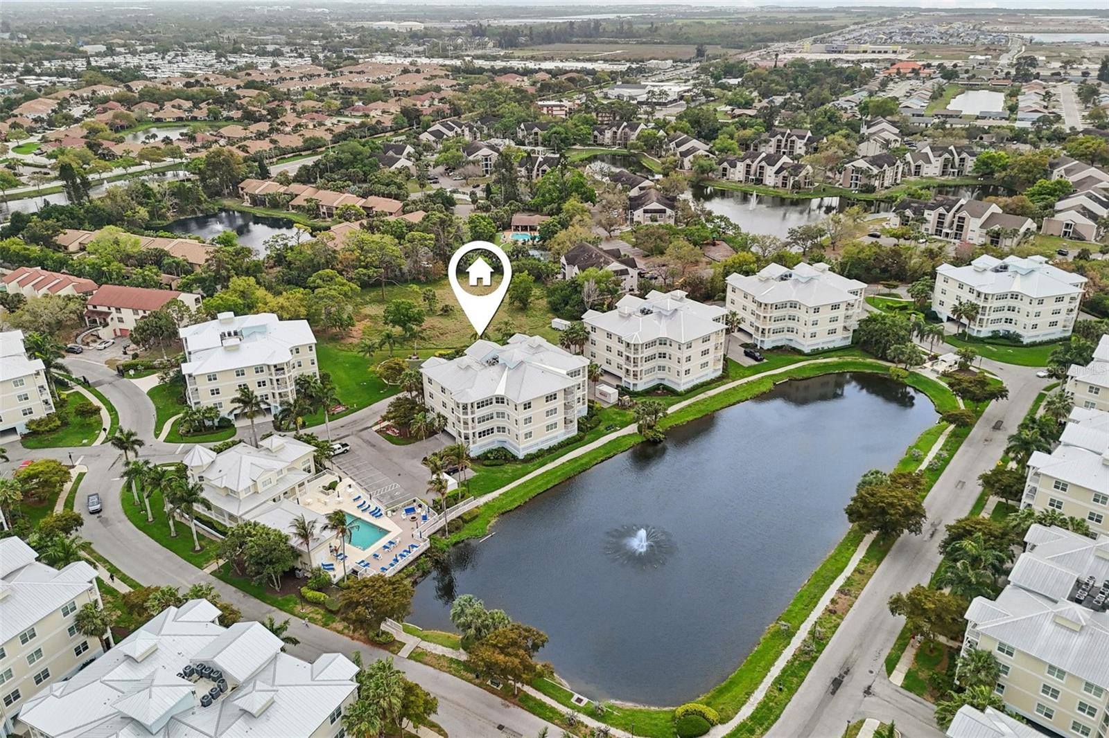 Welcome to this beautifully updated 3-bedroom, 2-bath condominium in the highly desirable Palma Sola Bay Club. Positioned above the garage level, this elevated residence offers added peace of mind while enjoying the convenience of condominium living. Inside, you'll find seamless flooring throughout the main living areas and a bright, open layout designed for comfortable living and easy entertaining. Soft neutral tones and tasteful updates create a clean, airy feel that is truly move-in ready.

The kitchen flows into the living and dining spaces, creating a functional floor plan ideal for everyday living and hosting guests. The primary suite offers a peaceful retreat with ample closet space and a private bath, while the additional bedrooms provide flexibility for guests, a home office, or family needs.

Palma Sola Bay Club is known for its exceptional amenities and welcoming community atmosphere. Residents enjoy a very social clubhouse featuring a fitness center, billiard/library room, and two kitchens designed for hosting large gatherings. Outdoors, relax at the heated pool with expansive sun decks or gather with friends at the covered bar and outdoor kitchen—perfect for enjoying Florida’s year-round lifestyle.

The community is pet-friendly, allowing large dogs, and features a gated dog park. Two covered, assigned parking spaces convey with the condo and are conveniently located near the elevator, along with a private storage unit ideal for bikes, kayaks, and beach gear.

Ideally located near Robinson Preserve, De Soto National Memorial, and a variety of dining and shopping options. Plus, the world-famous beaches of Anna Maria Island are just a short drive away.

Enjoy the perfect blend of comfort, convenience, and coastal living in one of Bradenton’s most desirable communities.