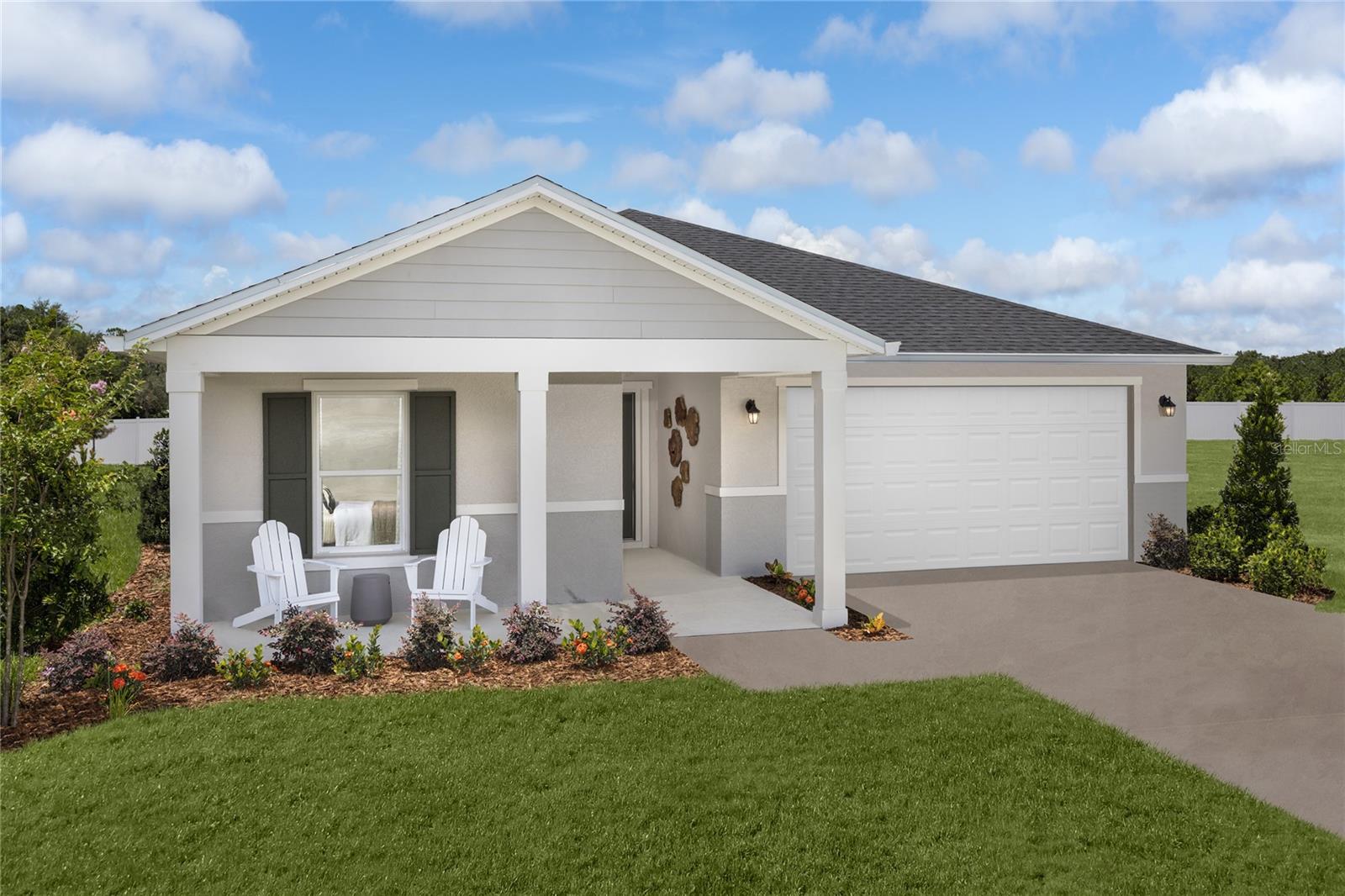 This thoughtfully designed, single-story unfurnished model home offers an open-concept floor plan with durable tile flooring throughout. The bright living area features soaring volume ceilings, creating an inviting space for everyday living and entertaining. The modern kitchen includes a spacious island, Silestone® countertops, Moen® faucet, Kohler® stainless steel sink, 36-in. upper cabinets, and premium Whirlpool® stainless steel appliances. The private primary suite offers a generous walk-in closet and connecting bath with a dual-sink vanity, linen closet, and walk-in shower with beautiful tile surround. Enjoy outdoor relaxation on the covered back patio, perfect for entertaining or unwinding.
