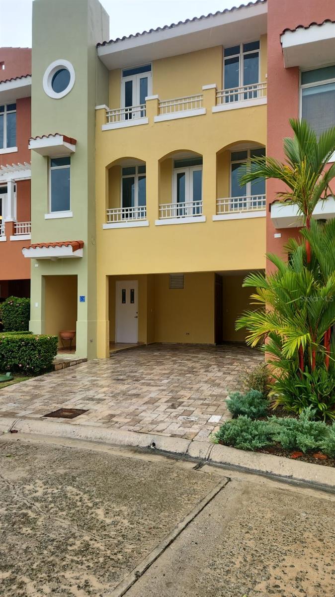 Introducing Plaza del Puerto #9 – a wonderful opportunity you won't want to miss! This beautifully designed home boasts a spacious layout that features three generous bedrooms and three full bathrooms, along with an additional half bath for convenience. The versatile family room could easily be transformed into a fourth bedroom to suit your needs. Enjoy the elegance of a formal living room and a dining area that seamlessly opens to a charming courtyard, creating a warm and inviting atmosphere.

The expansive kitchen is a chef's dream, offering plenty of storage and lovely views of the courtyard. Don’t forget to check out the stunning rooftop terrace! Many homeowners have crafted delightful outdoor kitchens there, making it perfect for entertaining friends and family while taking in breathtaking views. 

The community offers exclusive amenities, including your own boat slip! Whether you're looking for a fantastic investment, a second home, or a cozy retreat, this property is an excellent choice. For more details or to schedule a viewing, feel free to reach out or connect with your favorite broker.