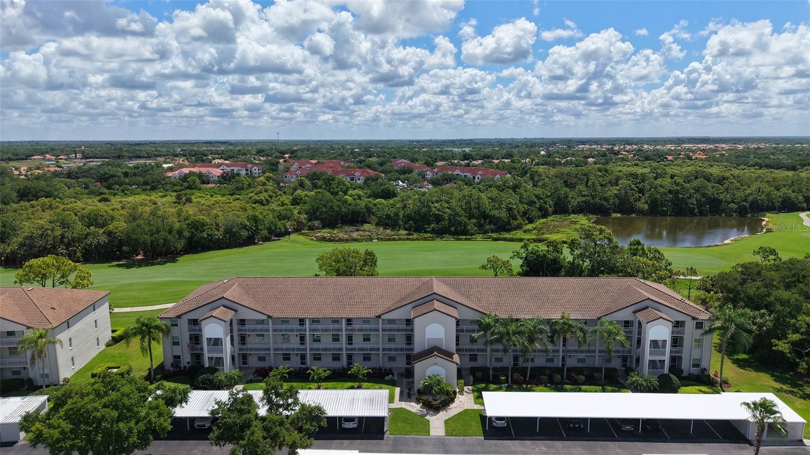 EXCELLENT VALUE and MOVE IN READY! Don't miss this stunning GROUND FLOOR 2-bedroom, 2-bath CORNER unit condo at the desirable Terraces at Stoneybrook Golf & Country Club. Enjoy breathtaking SUNRISE VIEWS from your lanai overlooking the FAIRWAY ON THE 8th HOLE. This condo offers PRIVACY AND ENJOYMENT since there are no other buildings across the fairway. As a corner unit, you have LARGER primary and guest bedroom suites filled with light from EXTRA WINDOWS. Renovated with elegant matching TILES THROUGHOUT, the kitchen was also updated with wooden block counters, very easy to maintain. Sold fully furnished and move-in-ready; life is good here. You have a laundry inside your condo and your car port as well as your storage unit are just outside the condo for your convenience. The Terraces have their own resort style pool as well as a rapid surface tennis/Pickleball court and a grilling area looking over the pond, preserve and golf course. You are walking distance to the Stoneybrook Golf & Country Club famous for its indoor & outdoor dining and its exceptional amenities which include a challenging Arthur Hills and Kipp Schulties designed golf course (renovated in 2024) and Har- Tru tennis courts. Other amenities include a well-equipped fitness center, heated swimming pool, and bocce ball courts. Adjacent to the scenic Legacy Trail for biking and walking and close to a plethora of shopping and dining, residents enjoy resort-style amenities just minutes away from Siesta Key Beach, ranked #1 in the US and # 4 in the world by TripAdvisor.