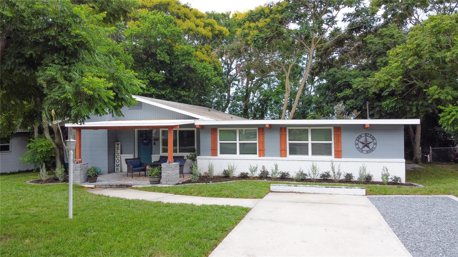 This quaint 3-bedroom, 2-bath home is nestled in the picturesque town of Lake Wales, Florida. Beautifully designed and tastefully decorated, you'll fall in love the moment you step through the front door. The spacious kitchen offers plenty of room to prepare your favorite meals. 
Generous closets provide ample storage in every bedroom. Tile flooring throughout adds both style and easy maintenance. The oversized primary suite provides a relaxing retreat with plenty of room to unwind. A desirable split-bedroom floor plan and separate laundry room add comfort and functionality to this charming home.
Step outside and discover the surprisingly spacious backyard, offering endless possibilities for outdoor living. The large wooden deck extends your living space and is the perfect spot for entertaining family and friends, enjoying your morning coffee, or relaxing at the end of the day.
Located in one of Central Florida's most charming communities, this home is just minutes from many of Lake Wales' most popular attractions. Spend the day exploring the beautiful gardens at the historic** Bok Tower Gardens**, enjoy lunch at the on-site café, or take advantage of the nearby Lake Wales sports fields and scenic** Lake Wailes Park**. With its small-town charm, convenient location, and inviting atmosphere, this home is ready to welcome its next owners.**