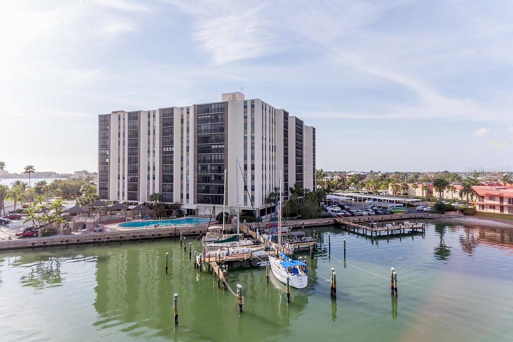 ANNUAL RENTAL AVAILABLE!! This 2-bedroom/ 2-bath condo offers a wonderful opportunity to live in one of the best neighborhoods in Treasure Island, just moments away from the beaches and sand! This condo features a full kitchen, washer and dryer, 2 full baths, beautiful tile flooring throughout, as well as a screened in porch with a lovely side view of the intracoastal waterway. Plenty of cabinet space, and also an extra storage closet for convenience. Property includes electronic exterior locks for 24/7 security, a community pool and jacuzzi, barbecue grills, and a common room with billiards. One parking space guaranteed to each unit, along with some additional guest parking. No pets allowed, according to the association. Ready for move-in! Schedule your showing today!