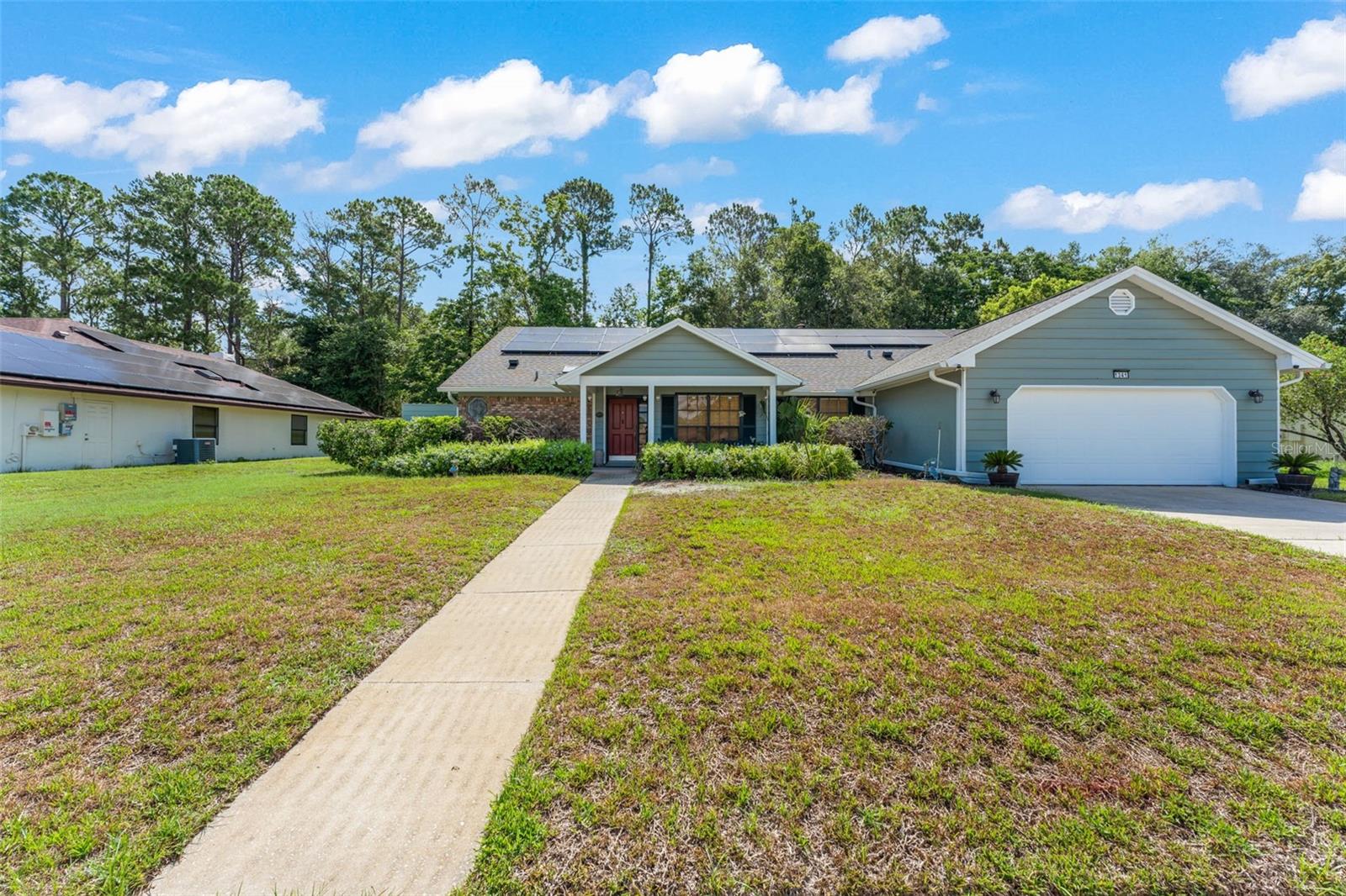 **This house comes with a REDUCED RATE through the seller's preferred lender. This is a lender-paid rate buydown that reduces the buyer's interest rate and monthly payment.**

Welcome to 1341 S Ridge Lake Circle, a beautifully maintained 4 bedroom, 2 bathroom home offering nearly 2,000 square feet of comfortable living space in the heart of Longwood. Thoughtfully designed with a spacious and functional layout, this home provides the perfect balance of comfort, style, and versatility for both everyday living and entertaining.

Natural light fills the inviting living areas, creating a bright and welcoming atmosphere throughout. The kitchen features real wood custom cabinetry, an extra large center island, bar cabinetry, a built in wine holder, a cast iron sink, granite countertops, and generous workspace. Matching cabinetry and granite countertops continue into the bathrooms, creating a cohesive and upgraded look throughout the home.

The family room features a working fireplace, adding warmth and character to the main living area. The four bedroom layout provides flexibility for guests, a home office, hobbies, or additional storage, with ample closet space and garage shelving.

Outdoor living is equally inviting with an extra large screened patio and a private backyard with no rear neighbors. Additional outdoor features include a community wall, newly planted fruit trees, spray sprinklers, solar lighting, and a solar illuminated house number sign.

Additional highlights include exterior paint completed approximately two years ago, new gutters, updated AC components, a generator hookup, two attic access points, laundry room cabinetry, and recently replaced garage door springs.

Perfectly situated in one of Longwood's most desirable areas, this home is just minutes from I-4, State Road 434, and Lake Emma Road, making commuting throughout Central Florida a breeze. Enjoy easy access to the shopping, dining, and entertainment options at Longwood Village, Longwood Hills Market, and Colonial TownPark in Lake Mary, all within approximately 5 to 10 minutes. Seminole Towne Center is also just 15 minutes away, while downtown Orlando can be reached in about 25 minutes. Zoned for highly regarded Seminole County schools, this home offers an added convenience with a private community access entrance to the school located just a few doors down, making the walk to school quick and easy. Parks, recreation, and everyday conveniences are also just moments away.

Offering the perfect combination of space, comfort, and an unbeatable location, 1341 S Ridge Lake Circle is ready to welcome you home. Schedule your private showing today.