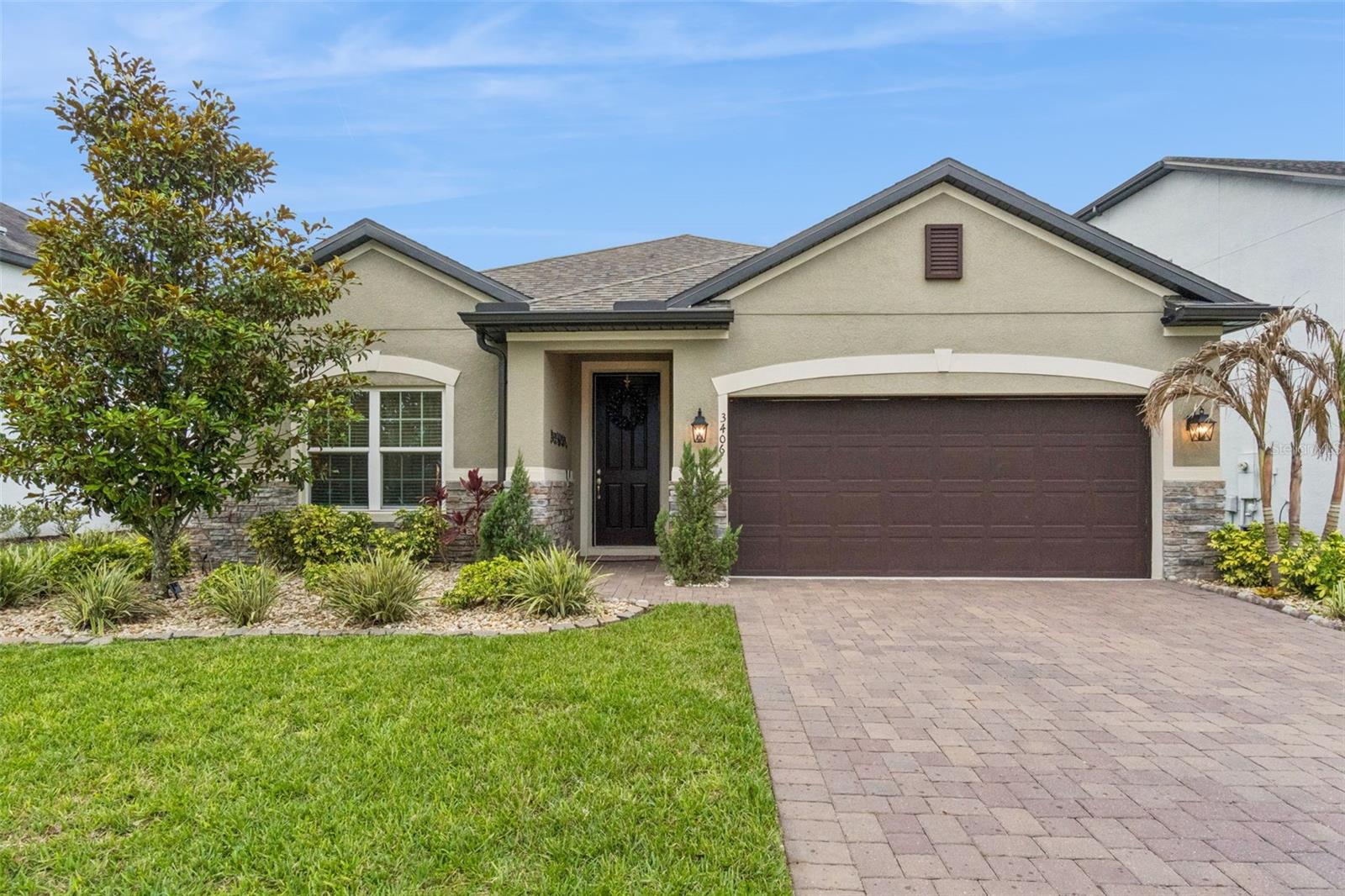 WELCOME to this beautifully maintained 4/2 home built in 2019!!!  Located in the highly sought-after community of Harmony. Thoughtfully designed for both comfort and entertaining, this home offers modern updates, inviting living spaces, and an outdoor setup that truly stands out. Step inside to find tasteful custom paint accents and a warm, cozy family room featuring a stunning wood fireplace wall installation that creates the perfect focal point just off the kitchen.The chef's kitchen comes upgraded with a pot filler making cooking easier than ever. The open-concept layout makes everyday living and hosting effortless.The spacious laundry room includes a separate utility sink for added convenience, while the well-maintained interior reflects pride of ownership throughout.
Enjoy Florida living year-round from the SCREENED PORCH overlooking CONSERVATION and a large landscaped backyard with plenty of room for gardening, relaxing, or entertaining. A generous paved area extends the outdoor living space, ideal for gatherings, grilling, or creating your own backyard retreat!
Located in the charming, family-friendly community of Harmony, residents enjoy access to resort-style amenities including 2 pools, playground, golf opportunities, dog parks, tennis courts and scenic surroundings. Lakeshore Park has basketball courts, soccer field, volleyball, table tennis, playground and splash pad. Entrance to Buck Lake Pier nearby as well! Around the town square you will find a bistro, spa, pet grooming, and restaurant. Situated within a GREAT SCHOOL DISTRICT and offering an easy commute to the beaches, this home combines lifestyle, location, and comfort in one exceptional package.