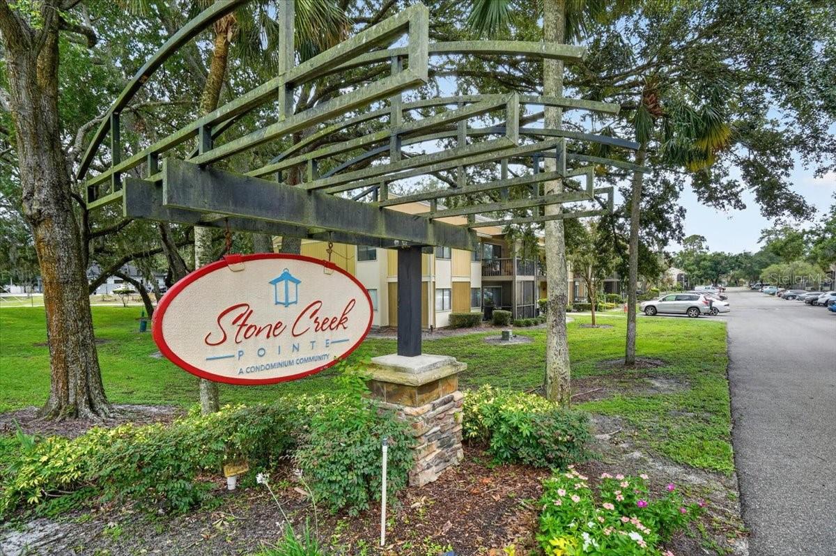 Welcome to this well-maintained, fully furnished ground-floor condo in the desirable Stone Creek Pointe community in Uptown Tampa near Fletcher Avenue. Located in the first building at the entrance, this unit offers convenient access in and out of the community.

This move-in-ready condo features 2 bedrooms, 2 bathrooms, walk-in closets, private bathrooms for each bedroom, a spacious kitchen, and a laundry room with washer and dryer. The covered, screened-in patio overlooks a peaceful wooded area with no rear neighbors.

Enjoy resort-style amenities, including a swimming pool, tennis courts, fitness center, and clubhouse. Community improvements are underway, including a new roof, exterior painting, and siding repairs. The seller has already paid the special assessment for the new roof in full.

Whether you want to make this your full-time home, owner-occupy the property, or use it as an investment property, this condo offers flexibility and opportunity. The community also allows certain rental options, including short-term rentals subject to association restrictions, making it an attractive choice for investors seeking rental income potential.

Conveniently located near USF, major hospitals, restaurants, shopping, Busch Gardens, Downtown Tampa, and major highways.