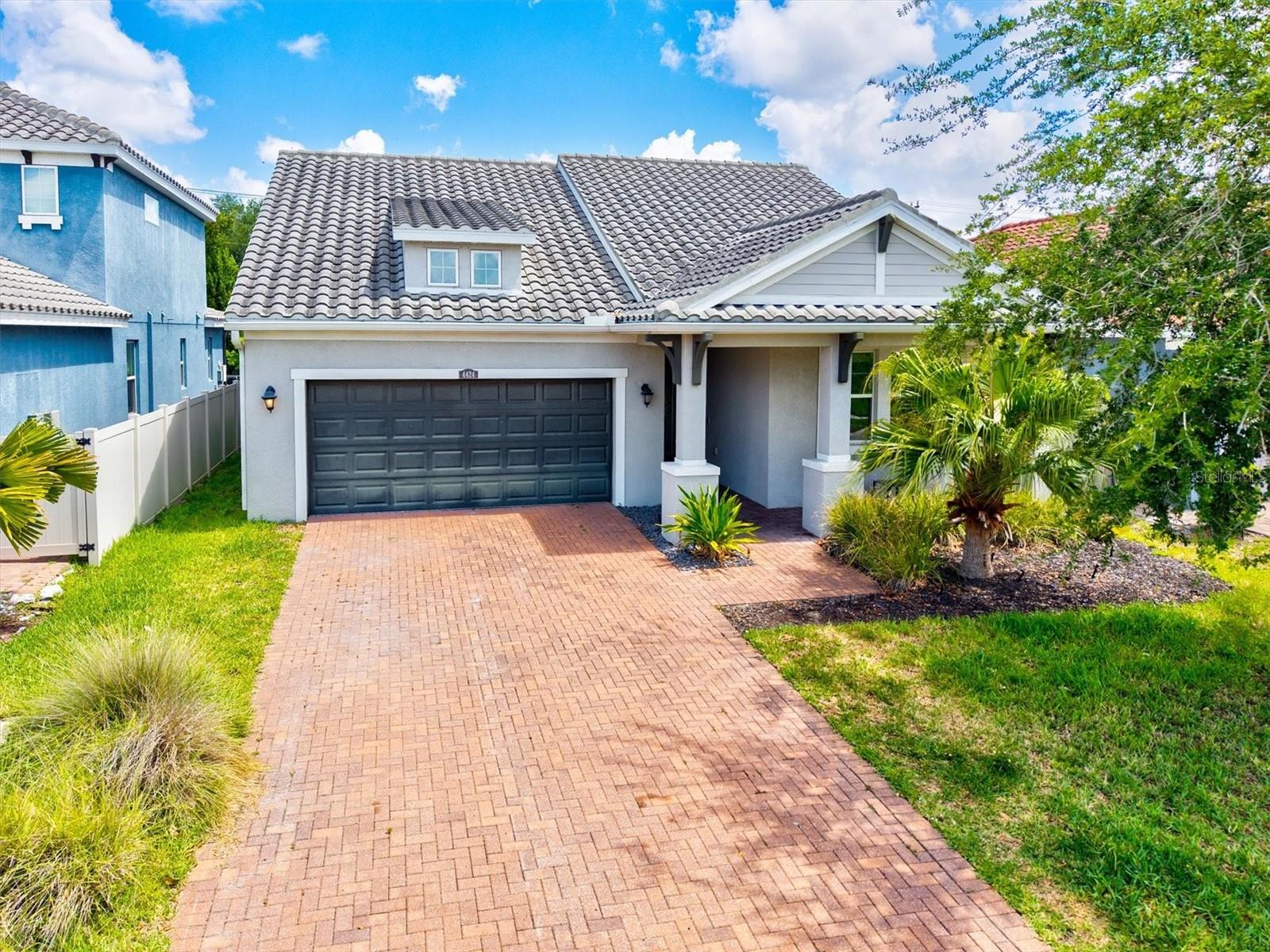 Situated in the highly sought-after community of Palms at Casey Key, this beautifully maintained 2017-built home offers the perfect blend of comfort, style, and location.  With low HOA fees and no CDD fees, this property delivers exceptional value in one of Osprey’s most desirable areas. From the moment you arrive, the paver driveway and lush tropical landscaping create a warm and welcoming first impression. Inside, the home opens to a bright and airy great room where tray ceilings and expansive triple-panel sliding glass doors allow natural light to pour in, creating an effortless connection between indoor and outdoor living. Designed with both everyday living and entertaining in mind, the kitchen serves as the heart of the home with a large center island offering ample seating, white cabinetry, stainless steel appliances, and a spacious corner pantry for additional storage. The thoughtfully designed split-bedroom floor plan offers privacy and comfort, while the owner’s suite feels like a relaxing retreat with tray ceilings, a large walk-in closet, dual vanities, and a walk-in glass shower. Step outside to your private patio overlooking the in-ground spa — the perfect place to unwind after a beach day, enjoy a quiet evening under the stars, or cool off during warm Florida afternoons.

Location is everything, and this home truly delivers. Ideally situated just minutes from nationally ranked Pine View School, less than a mile from the Casey Key boat launch and waterfront tiki bar, and only about 15 minutes to both Nokomis Beach and Siesta Key Beach, you’ll enjoy easy access to some of the area’s best boating, dining, shopping, golf, parks, and coastal lifestyle amenities. Whether you're looking for a full-time residence or the perfect Florida retreat, this home offers the lifestyle so many buyers are searching for.