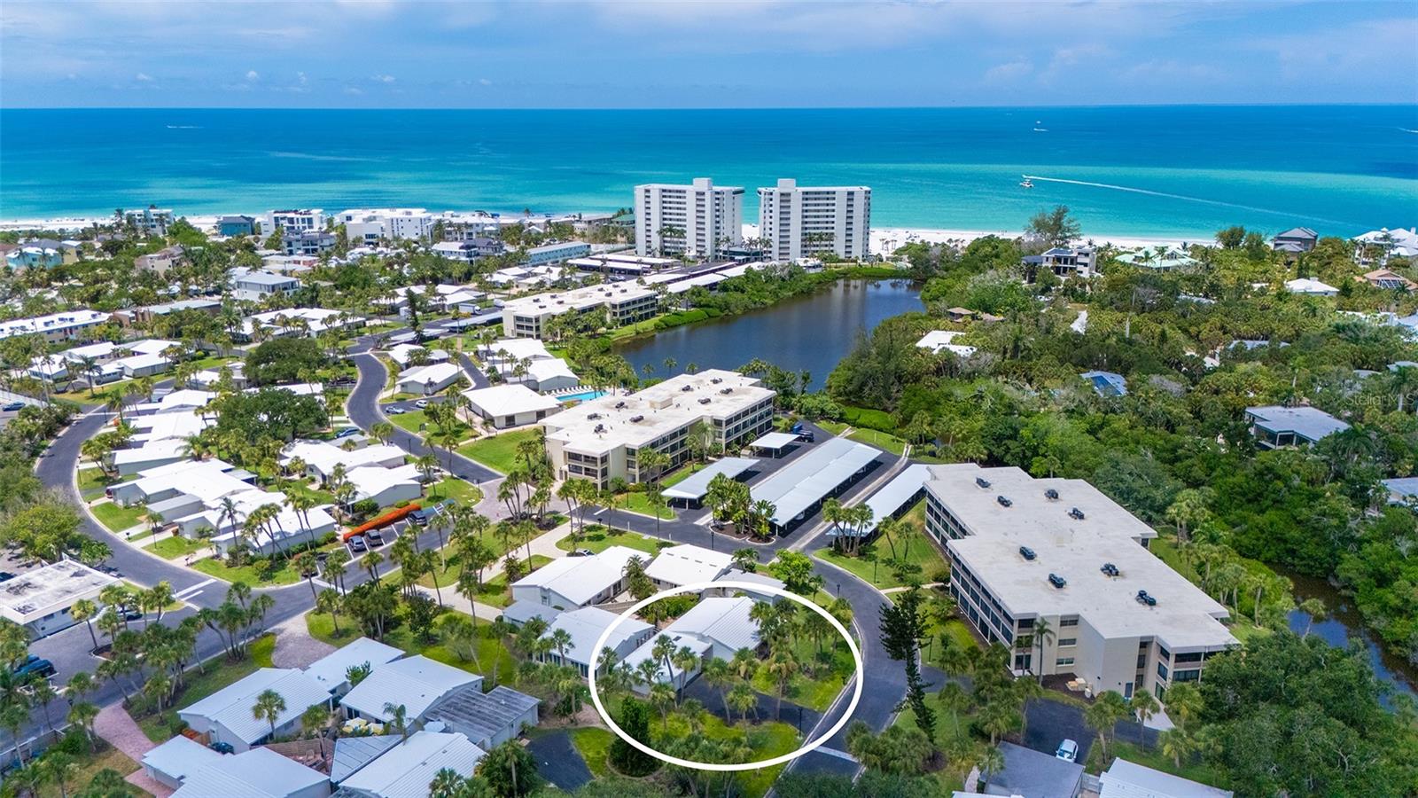 This rare, freestanding 3-bedroom, 2-bath villa presents an exceptional opportunity to create the coastal home you've always envisioned in the premier Gulf front community of Whispering Sands. With its highly desirable floor plan, attached 2-car garage, and private fenced patio, this residence offers the perfect foundation for a truly personalized retreat. Professionally remediated following Hurricane Helene, this villa is being offered in its current condition. Featuring concrete floors, partial drywall, and no kitchen or bathroom fixtures, this residence offers a true blank canvas – inviting you to select every finish, fixture, and detail to create a home that reflects your own style and vision. Washer and dryer hookup is located in the garage. Important exterior improvements have already been completed, including NEW 2025 villa and garage roofs and fresh exterior paint, while a comprehensive two-year community landscaping enhancement plan is in the planning stages. Life at Whispering Sands is about far more than just your residence. Enjoy 800 feet of PRIVATE quartz sand beach, two heated pools, clubhouse (currently undergoing complete remodeling that will also include a catering kitchen and fitness rooms), beachside Tiki Hut, shuffleboard courts, canoe/kayak storage, and professionally maintained grounds, all just a short stroll from the shops, restaurants, and vibrant charm of Siesta Key Village. The comprehensive HOA fee includes cable, high speed internet, recreational amenities, landscaping, reserves escrow, HOA insurance, on-site management & maintenance team, security, water and sewer – allowing you to spend more time enjoying the island lifestyle. Freestanding villas in Whispering Sands are exceptionally rare. This is a unique opportunity to create a home that reflects your personal taste while enjoying maintenance-free living in one of Siesta Key's most desirable 55+ Gulf front communities.