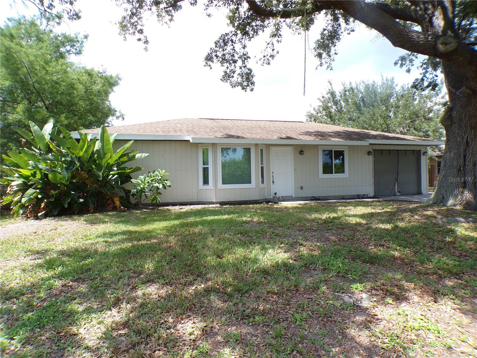Beautiful 2 bed 2 bath home with one car garage now available for rent.  This home has all new impact resistant windows and a fresh coat of paint.  Situated on a large lot with mature landscaping and a huge rear deck in the fenced back yard.  Home comes with washer and dryer, sorry no pets please.  Make this your piece of Paradise.
