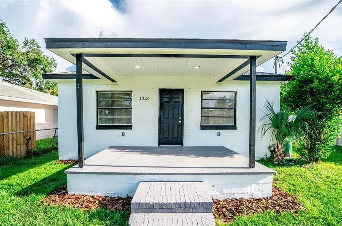 Virtually Staged. Located in the heart of West Tampa and within the desirable Plant High School district, this 2-bedroom, 1-bath home offers a combination of updates, convenience, and investment potential. The functional floor plan features durable tile and laminate flooring, ceiling fans throughout, and an updated HVAC system. The kitchen is equipped with a refrigerator, range, and microwave, while the in-unit laundry adds everyday convenience.

Originally built in 1950, the home has undergone significant updates in recent years, including the roof, plumbing, electrical system, and HVAC. Situated on a 4,750-square-foot lot with no HOA, the property provides flexibility for homeowners and investors alike.

Conveniently located just minutes from Downtown Tampa, Hyde Park, the University of Tampa, Tampa International Airport, the Straz Center, shopping, dining, and major roadways. The property's central location and proximity to Tampa's business and entertainment districts make it an attractive option for those seeking easy access to everything the city has to offer.

Whether you're looking for a primary residence or an investment property, this home presents a great opportunity in one of Tampa's established and growing neighborhoods.