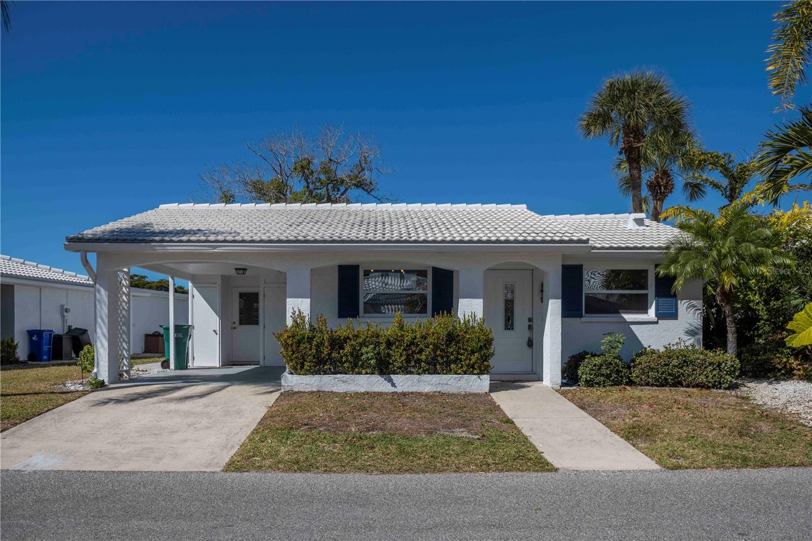 GORGEOUS COMPLETELY REMODELED Villa with Lake Views in Spanish Main Yacht Club!!
Welcome to effortless coastal living in this beautifully remodeled 3-bedroom, 2-bath villa located in the highly sought-after Spanish Main Yacht Club. Rarely available, this 1,516 sq ft STANDALONE villa offers a larger footprint than most in the community and includes a true third bedroom with serene LAKE VIEWS.
The recent remodel brings a fresh, modern feel, complemented by an open-concept floor plan, elegant tile flooring throughout, and abundant natural light. Enjoy peace of mind with NEW WATER HEATER, a NEWER ROOF (2023)AND NEWER A/C system (March 2024). 
Spanish Main Yacht Club offers a maintenance-free, pet-friendly community with resort-style amenities, including a large waterfront pool overlooking the marina, a 40-slip deep-water marina with no bridges to Sarasota Bay and the Gulf, and deeded beach access just steps away. Shopping, dining, and the charm of St. Armands Circle are all minutes from your door.
While this is an active 55+ community, ownership is open to all ages, with full-time residency beginning at 50.
"Florida remains the envy of the country, with many of our markets winning awards for being among the best places to live or retire. Sarasota SRQ Airport's soaring success added 30 flights in 2024 and 2025, significant passenger growth, a new $72M runway and terminal, and ranks No. 1 best resort airport in the country, where passengers can get off a plane and feel like their vacation has begun. It's all about investment. This home in  the master-planned community of the Spanish Main Yacht Club could be your destination of choice. Features include a spectacular pool and spa, kayak launch, marina, outdoor grills, and lush tropical landscaping. There is a shell path for walking along to a deeded beach access to enjoy the sand and world-class sunsets. There is also on-site management and maintenance staff making where home and away share the same address. Longboat Key is the only barrier island on the West Coast of Florida to have relocated all overhead utilities underground for improved reliability and aesthetics, and LBK landed on the Forbes Travel Guide's list of Top 12 Destinations for 2025."
Furniture Package Available. 

Schedule your private showing today.