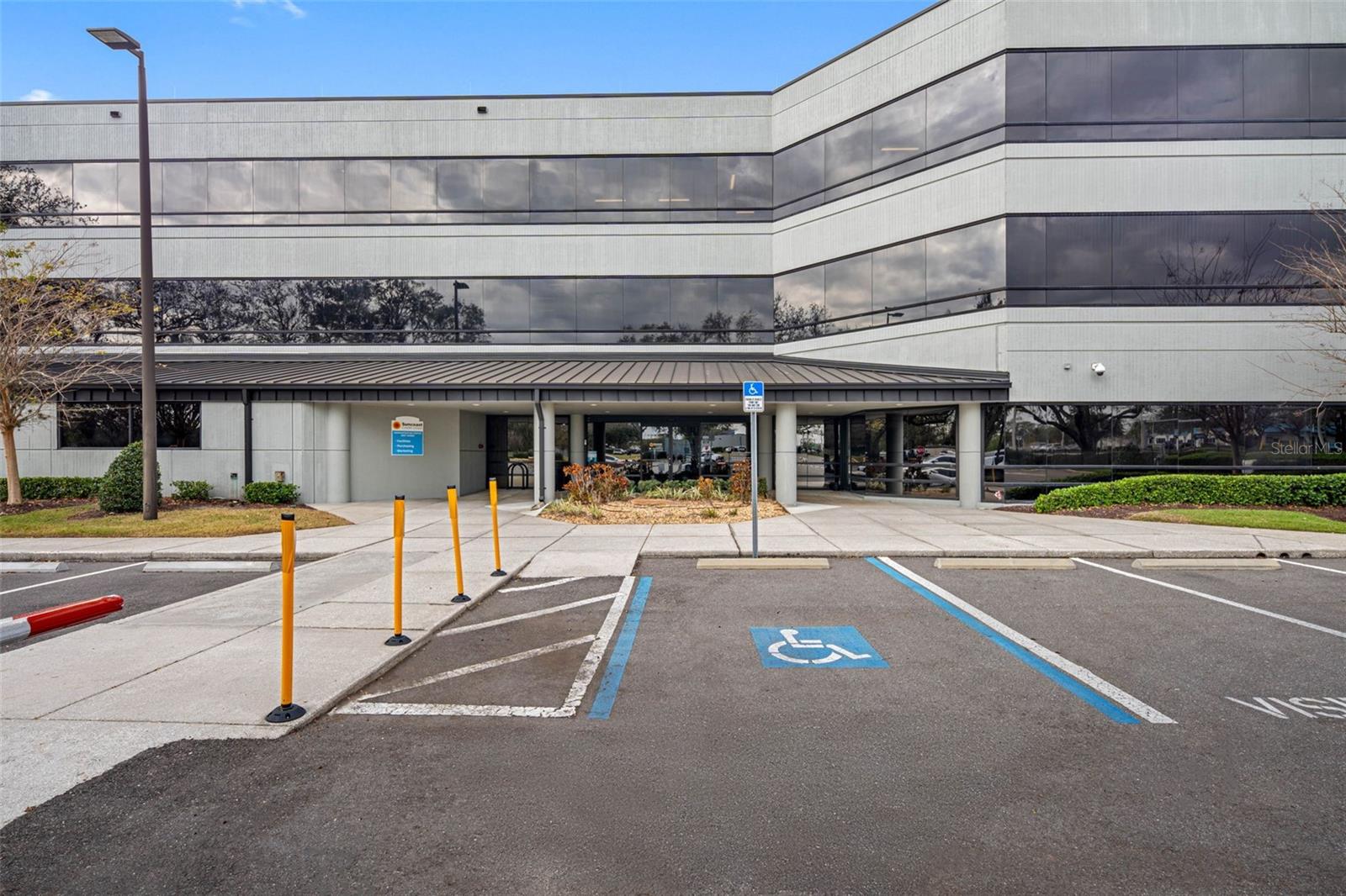 Welcome to an exceptional investment opportunity with this versatile and well maintained office building, strategically positioned on a spacious 5.22-acre plot near I4/Orient Road Exit and I75. With a total area of 79,728 square feet, this property offers a variety of features that make it an ideal candidate for redevelopment or continued use in its current state. Property consistes of East and West Annex 3 story office building with breazeway in between wings + an additional mailroom/warehouse building. Ample parking on site both secured surface and under building plus visitor parking for public.