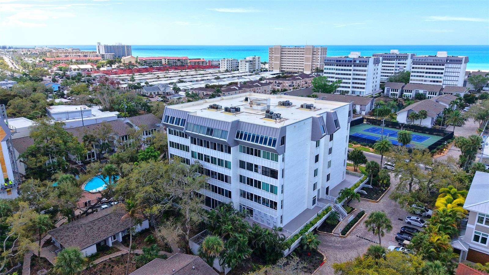 PRICE IMPROVEMENT OF $20.000!! Turnkey coastal living in the desirable mid-rise tower at Peppertree Bay on Siesta Key. This sought-after split-plan residence offers bright open living spaces, exceptional privacy, and the convenience of effortless island living with resort-style Gulf-to-Bay amenities just moments from world-famous Siesta Beach.

Offered fully turnkey furnished, this beautifully maintained two-bedroom, two-bath residence is ready for immediate enjoyment as a primary residence, seasonal retreat, or investment property. The split-bedroom layout provides privacy for owners and guests, while the open living and dining areas create a comfortable space for everyday living and entertaining.

A feature seldom found in these units is the dedicated laundry room with a utility sink, adding both convenience and functionality. The residence also includes elevator access, covered parking, and generous storage.

Peppertree Bay is one of Siesta Key’s most sought-after Gulf-to-Bay communities, offering private beach access to the powdery quartz sands of Siesta Beach, two heated pools, tennis and pickleball courts, a fitness center, clubhouse, fishing pier, and beautifully maintained tropical grounds. Ideally located just minutes from Siesta Village dining, shopping, and entertainment, this residence offers the best of relaxed island living.