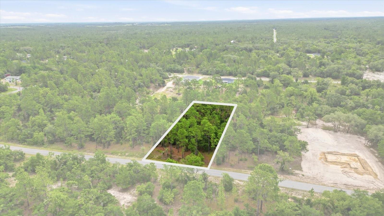 0.99-acre residential lot in Rainbow Lakes Estates. Conveniently located near Rainbow River, Withlacoochee River, and Lake Rousseau. Enjoy easy access to boating, fishing, kayaking, and outdoor recreation while remaining close to shopping, dining, schools, and other everyday amenities. Excellent opportunity to build your dream home in a peaceful Florida setting.
