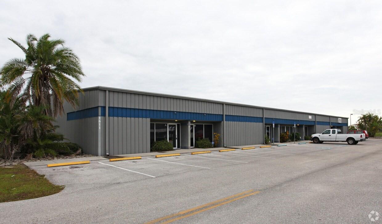 Fully air-conditioned office/flex suite available at 1611 12th St E, Suite B. This versatile, move-in-ready space is ideally suited for professional office, flex, or light-industrial users seeking a comfortable, climate-controlled environment throughout.
The suite opens into a welcoming reception area leading to two large executive offices that can also be used as 2 conference room. The back half offers a bright, open air-conditioned area featuring three private offices, a kitchenette, and a generous open zone that can function as warehouse, assembly, or additional cubicle/workstation space.
12" x 14' roll-up door — currently drywalled over but easily retrofitted back to full function — provides the option for drive-in or loading access, adding true flexibility for a wide range of business uses.
Property Highlights

Air-conditioned throughout — office and rear flex area
Welcoming reception/lobby area
Two large executive offices 
Three additional private offices
Kitchenette / break area
Open flex space for warehouse, assembly, or cubicles
12' x 14' roll-up door (drywalled over, easily reopened)
Move-in ready; suited for office, flex, or light-industrial use
