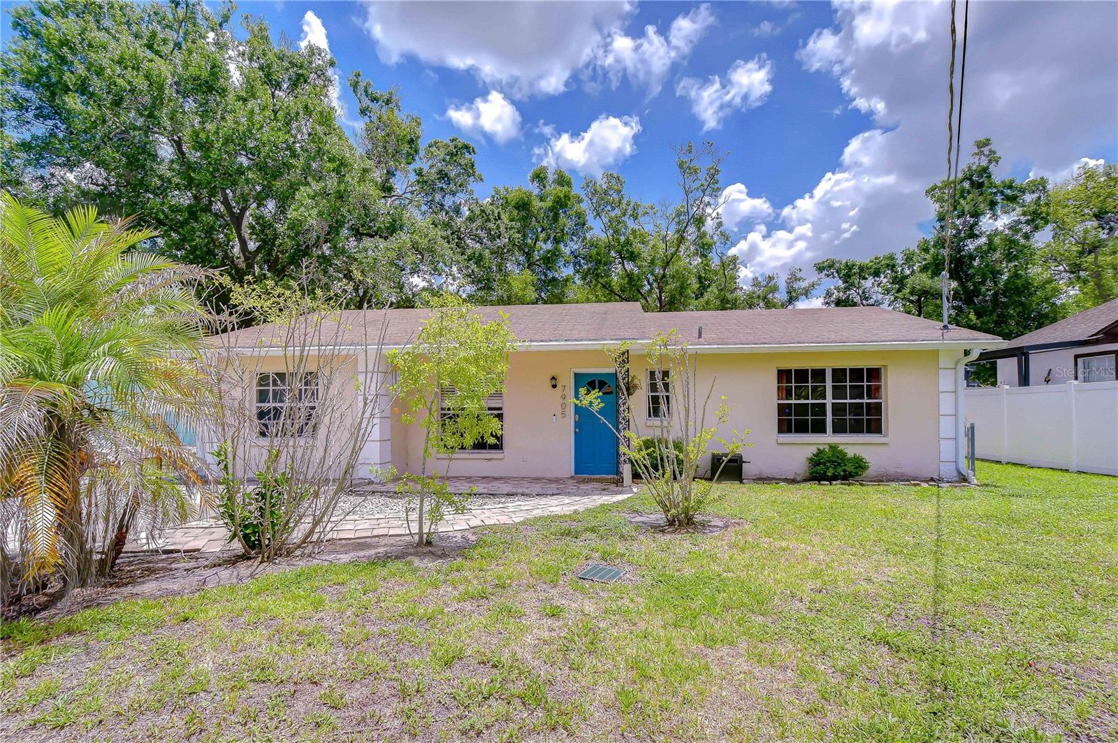 Beautiful 4-Bedroom, 3 Bath Home with No HOA or CDD Fees! Step into this spacious and inviting home featuring a Huge Backyard - perfect for entertaining, relaxing, or playing your own football game.  Imagine your own outdoor oasis with plenty of room for a garden or any vision you have in mind. Inside, you'll find an open floor plan that welcomes you as you walk through the front door. To your left enjoy a cozy dining area and the spacious Primary Bedroom, thoughtfully separated from the other bedrooms for privacy. The primary suite includes dual closets and an ensuite bathroom with a shower/tub combo. The Kitchen shines with stainless steel appliances, beautiful laminate flooring, creating the perfect space for cooking and gathering. The large living room offers a lovely view of the backyard and the mature shade providing trees, making hot summer days more comfortable. A handy storage room is located on the porch just off to your right.
The home also includes: -Bedroom 2 currently set up as an office featuring a ceiling fan, and bult in closet. - Bedroom 3 spacious currently being used as an office.  Bedroom 4 Guest bedroom with its own private ensuite bathroom with shower. 
Additional perks include an LG Washer and Dryer, along with the stainless steel refrigerator, microwave, and dishwasher-all included in sale.  Truly move in ready! Enjoy the great location just minutes from USF, UT, Busch Gardens, Raymond James Stadium, Straz Theatre, Seminole Heights with tons of restaurants and shopping. Plus you are only 4-5 minutes from I-275 for easy commuting. 
Schedule your appointment today and make this wonderful house your new home!