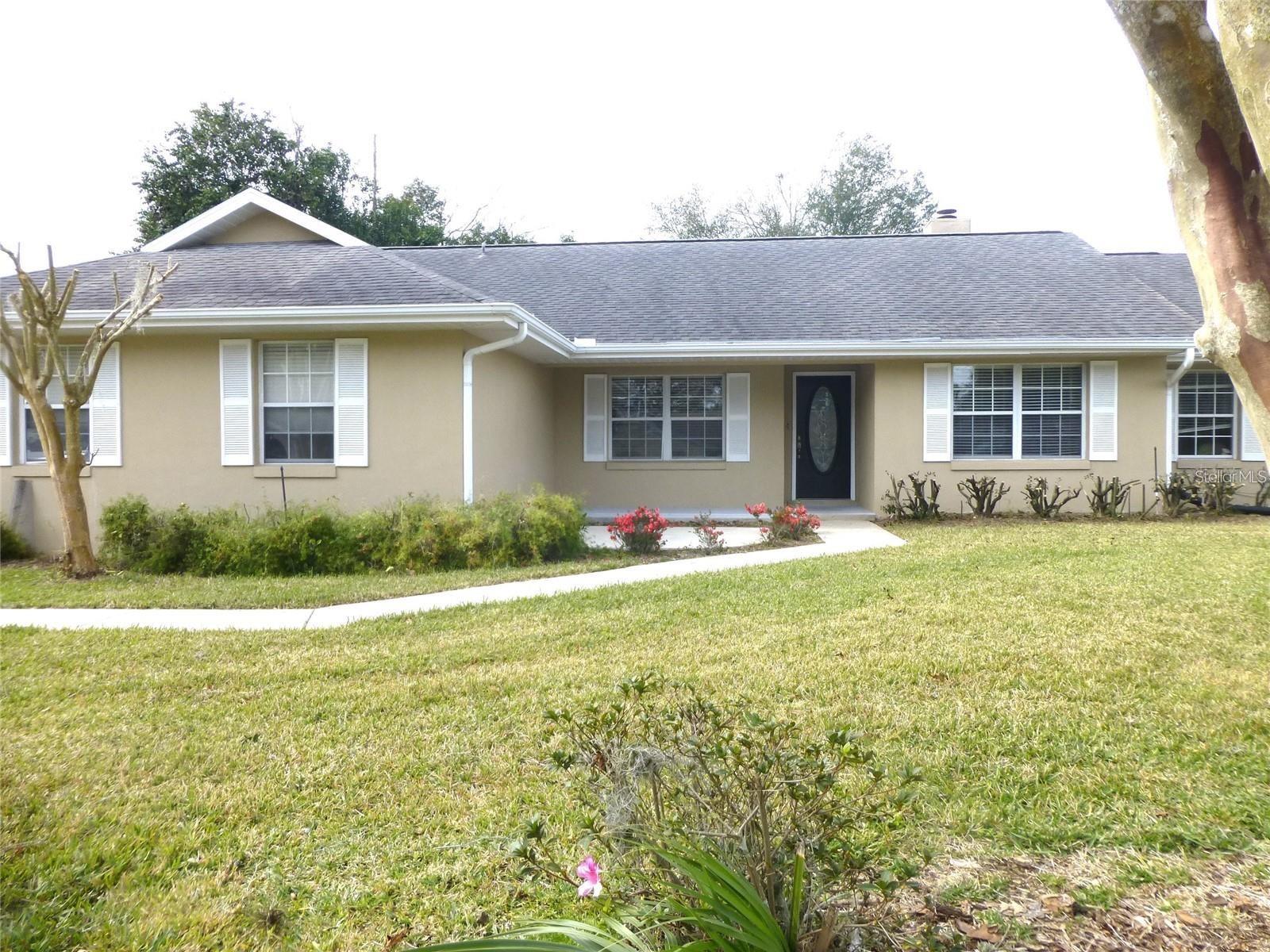 Beautiful updated tradional 3 Bed 2 Bath with Living, Dining & Family rooms with tile floors. Big beautiful open Kitchen with newer cabinets & appliances. Adjacent to the Family Room, with large breakfast bar, cathedral ceilings, and sliding glass door. Split bedroom floor plan featuring laminate flooring and ceiling fans with light fixtures. Primary Suite features updated bathroom and walk-in closet and sliding glass door to patio. Side entry 2 car garage and extra-long dirveway. The fenced back yard boasts a 12x20 screen room and 12x20 patio, and a large staoage shed. Private and nicely landscaped. Extra clean rental in great friendly neighborhood close to parks, shopping, restaurants, schools and golf course.