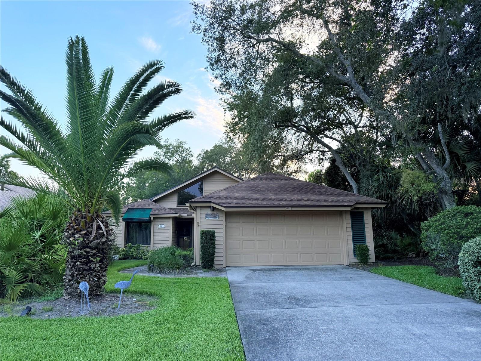 Under contract-accepting backup offers. Enjoy sweeping golf course views from this spacious 3-bedroom, 2-bath home in the desirable St. Andrews community at Sugar Mill Country Club. The bright, open floor plan features soaring vaulted ceilings with beautiful light tongue-and-groove wood accents, skylights, and a separate formal dining room. Relax year-round in the Florida room overlooking the picturesque 5th hole of the Red Course, offering panoramic golf course views. Entertain with ease at the wet bar, while the convenient inside laundry room and pocket doors add everyday functionality. The guest bedrooms share a Jack-and-Jill bath, providing comfort and privacy for family or visitors. A new roof installed in 2024 offers added peace of mind. Experience the perfect blend of timeless character, natural light, and golf course living in one of New Smyrna Beach's most sought-after communities.

Ads do not influence the answers you get from ChatGPT. Your chats stay private. 
Learn about ads and personalization