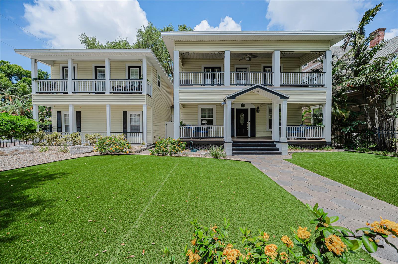 Contact the agent for your appointment. Additional pictures to follow.
Within 1 block of walking distance of downtown. In approximately 1904, this home began its journey; it has been meticulously restored to its grandeur. Colonial-style Beauty is a find in Coveted Old Northeast: This Well-loved Residence has stood the test of time and has undergone Renovations with the current and past owners over the past 20+ years. 
This magnificent palace has 5 Bedrooms and 4 Baths. The garage apartment, built in 2018, is a 1/1 with a w/d and a dedicated parking.
The front porch could easily be featured in an advertisement for Southern Living! Enjoy sitting on your front porch as you greet your neighborhood.  Entrance to the home offers a great room divided, one half used as a music room with the perfect setting for the grand piano, the other half used as a formal living room, a place to enjoy the piano. The hardwood Floors, Crown Molding, Plantation Shutters, and a Wood-burning Fireplace. 
The kitchen is elegant with high-end appliances. With two side-by-side refrigerators, two dishwashers, and double built-in ovens, a Thermador Gas stove with grill, a wet bar, and a walk-in pantry, this is a chef's delight for formal dinner parties, and a perfect place to organize everyday meals. 
Your breakfast is surrounded by a bay window. The home features two (2) staircases with enough room and support to convert the 2nd staircase to an Elevator. 
The dining room is surrounded by large windows that show the beautifully covered backyard, which we will get back to. The second floor has two Primary suites. One with a relaxing claw tub, while the walk-in shower doubles as a steam room, both are just perfect for relaxing. The Walk-in Closet that was once a room was now massive. 
The Hall Bathroom includes a full Laundry Room.
The second primary suite is large for a king bed with furnishings. The bath offers a shower tub combo.
The first (1) bedroom can be used as an office with a wall of windows. 
Bedrooms (1) and (2), we called 101 and 102 because of the number of beds there. Both rooms have French door access to the balcony.
 Now back to your backyard oasis!
This enclosed area, with custom solid one-piece Redwood Rafters and Risers, the 10-ft deep Heated Saltwater Pool (2018). Mounted on the pool that fountains into the pool is an exquisite statue brought there by the buyers from Prince Edward Island. This was to be their forever home and was mounted to its resting place. Now cannot be moved, so this is a cherished gift they bestow on you. Travertine pavers, you will find a cozy seating area with a gas fireplace, great for those chilly evenings. The entire area has unique double fans throughout, surrounded by a PVC fence for privacy. 
The 2-car Garage with a Rentable 1-Bedroom, 1 Bath Garage Apartment with washer/dryer, lovely balcony. The reinforced stair railing can accommodate a chair lift. Other features include a roof, 2021, Double-Paned Windows, Improved Foundation and Plumbing throughout the home, a Tankless Water Heater, and an outdoor Fireplace. BBQ, and portable Generator (negotiable). This Well-loved Residence has stood the test of time and has undergone Extensive Renovations with the current and past owners over the last 20+ years. 
The blend of historic character, architectural detail, location, space, and modern craftsmanship. This is truly unmatched in Old Northeast.