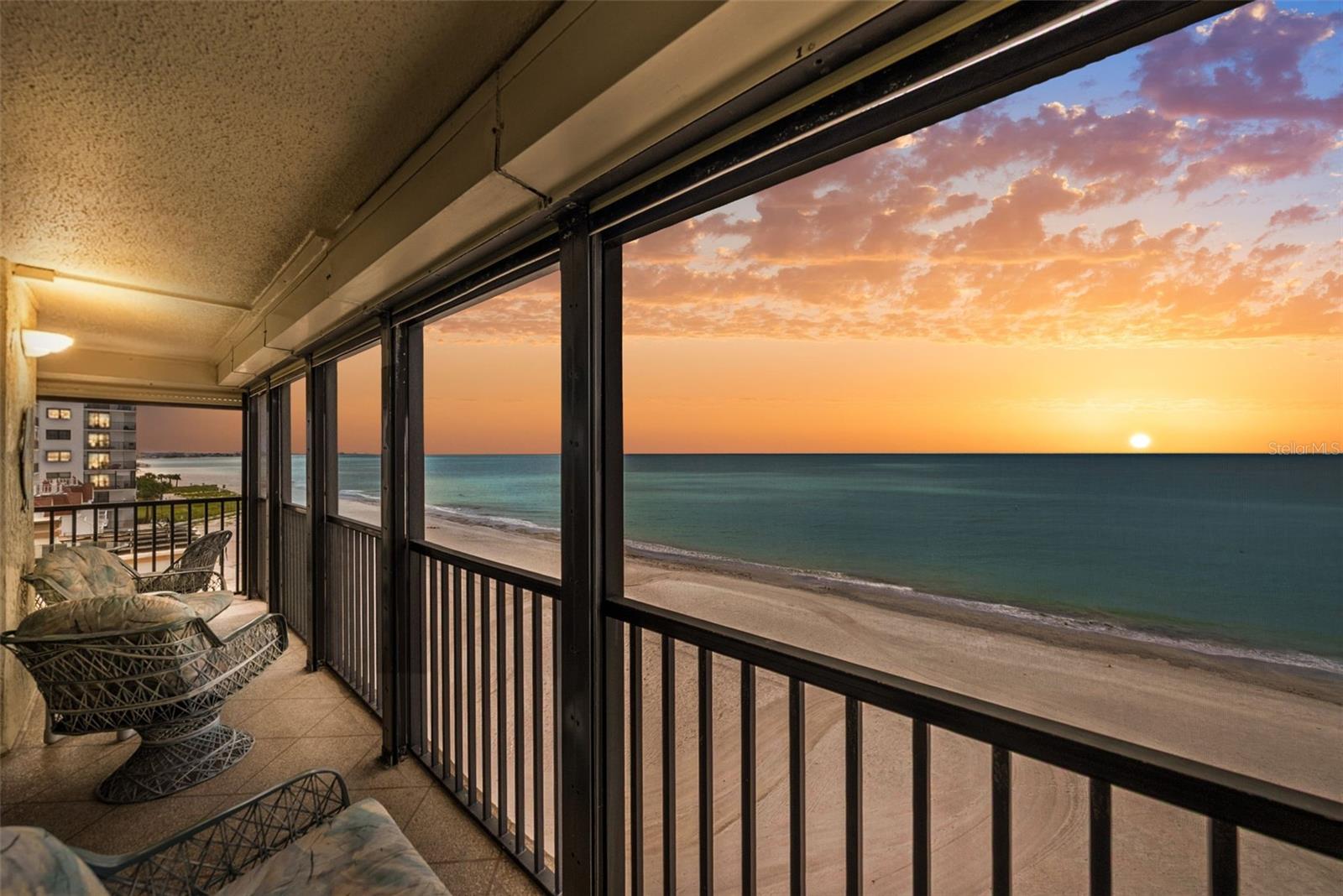 Premium Direct Gulf Front End Unit at Shores of Madeira. Discover exceptional beachfront living in this rare 2-bed, 2-bath end unit. Positioned directly on the Gulf, the residence provides uninterrupted, panoramic Gulf views from all main areas. The spacious, open-concept interior features a light-filled plan designed for maximizing privacy. The home’s standout feature is the oversized, private wrap-around balcony, a retreat perfect for enjoying coastal breezes and spectacular Florida sunsets. Shores of Madeira is a highly desirable community, offering resort-style amenities: a heated pool, hot tub, clubhouse, BBQ area, and private direct access to the white sands of Madeira Beach. Centrally located on Gulf Blvd, you are minutes from dining, shops, and entertainment at John’s Pass Village and Boardwalk. With a 30-day minimum rental policy, it is ideal for investors or a perfect primary or second home. This residence sold fully furnished.  Electric roll-down shutters are featured throughout the balcony for storm protection.
