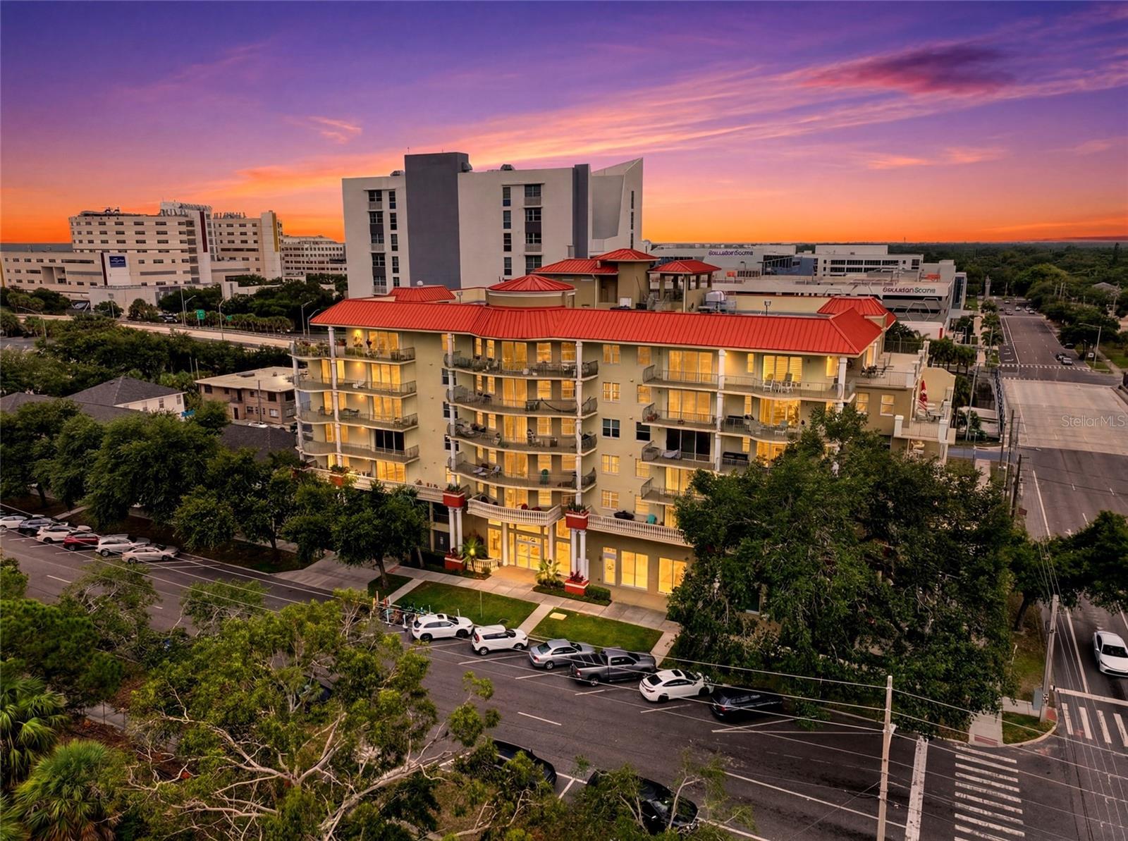 Experience the best of downtown St. Petersburg living from this beautifully updated residence in the sought-after Orion building. Offering 1,640sqft, this spacious condominium features two bedrooms, two-and-a-half bathrooms, an office/den, and an open floor plan designed for both everyday living and effortless entertaining. The main living area is bathed in natural light and flows seamlessly onto an expansive private balcony spanning the entire width of the residence. Whether you're enjoying your morning coffee or relaxing in the evening, you'll take in stunning views of Downtown St. Petersburg, Tropicana Field, and spectacular sunrises and sunsets. The well-appointed kitchen opens to the living and dining areas and has been enhanced with new appliances, recessed lighting, and granite countertops. Just beyond, a versatile office/den with custom built-ins provides an ideal work-from-home space, library, or flex room. Privately situated on one side of the home, the expansive primary suite offers direct balcony access, a spacious walk-in closet, and a thoughtfully renovated en suite bathroom, completed in 2024, with dual vanities, a walk-in shower, and a convenient linen closet. Across the home, the secondary bedroom features a custom Murphy bed with built-in storage and desk, creating a comfortable guest suite that easily doubles as an additional office. Numerous upgrades enhance both comfort and peace of mind, including brand-new hurricane-impact windows and sliding glass doors (2023), a new HVAC system (2025), renovated bathrooms (2024), crown molding, plantation shutters, electronic shades on the living room and primary bedroom sliders, tile flooring throughout the main living areas, a tankless in-line water heater with water softener (2019), and recessed lighting throughout. For convenience, this condo includes one assigned parking space in the secured, elevated garage. Residents of Orion enjoy secured building access and exceptional amenities, including a resort-style pool, fitness center, club and card room, exterior maintenance, building insurance, escrow reserves, water, sewer, trash, and recycling, which is all included in the HOA fee. Ideally located in the heart of Downtown St. Petersburg, you'll be just moments from Central Avenue, award-winning restaurants, local breweries, shopping, museums, the Pinellas Trail, Tropicana Field, the St. Pete Pier, and the city's picturesque waterfront parks. This is an opportunity to enjoy an exceptional home while embracing one of Florida's most vibrant downtown lifestyles.