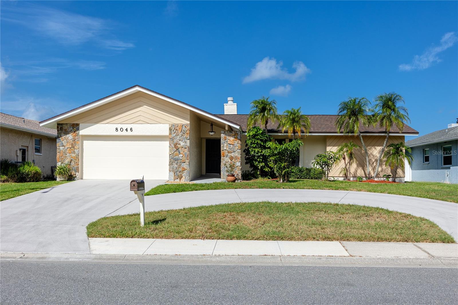Direct water frontage on the Intracoastal is a rare find in Seminole, and rarer still is this view: mangrove conservation land holds both bordering shorelines, with Town Square nature park's pristine, undeveloped frontage directly across the waterway. This well maintained 3 bedroom, 2 bath block home was built around that water and views, and every major living space connects to it.
Inside, the renovation is thorough, with new luxury vinyl plank running through most of the home, updated ceramic tile in the primary suite and bath, and freshly painted interiors and exterior throughout. The living room stretches an impressive 22 by 24 feet, anchored by a floor-to-ceiling stone wood-burning fireplace and framed by coffered, vaulted ceilings, with oversized sliders opening the full rear wall to the screened lanai and pulling the water view directly into the room. The kitchen and dining area share that same open flow, and a second, independent set of sliders connects the kitchen directly to the patio, making the oversized lanai ideal for entertaining or a quiet sunset meal.
The primary bedroom runs an impressive 14 by 20 feet with direct slider access to the screened patio and its own en suite bath, complete with a nearly 7 feet long walk-in shower. Two additional bedrooms sit on the opposite end of the home for privacy, and the guest bath was updated within the past three years with a double granite vanity, a new tub with shower, and fresh tile in the alcove, wainscoting, and flooring. The laundry room is inside with built-in cabinets, and separate entrances from both the living space and garage make cleanup after outdoor activities easy. The two-car garage offers workshop space and built-in storage, while a detached shed adds room for fishing gear and outdoor equipment without sacrificing parking.
Outside, the private dock sits at the water's edge with a boat lift frame already in place and ready for upgrade, and the yard transitions directly to the dock with an unobstructed waterline, no shared access and no easement compromise. The roof was replaced three years ago alongside new soffit and fascia, and the driveway has been resurfaced, adding extra curb appeal to this turnkey home.
Block construction, no history of flooding, and no HOA make this a strong candidate for a primary residence or a rental, and it’s unincorporated status allows no minimums on short term rentals. The location is just as special as the house itself, with the Pinellas County boat ramp, fishing pier, and Boca Ciega Millennium Park all under two miles away, Seminole City Center under three, Indian Rocks Beach a quick fifteen minutes west, St. Pete-Clearwater Airport ten minutes north, and the Pinellas Trail close enough to reach without loading the car.
This Seminole waterfront home with this combination of space, water access, and completed updates is worth seeing in person whether you are looking to create your waterfront slice of paradise or a savvy investor looking to create a profitable coastal retreat!