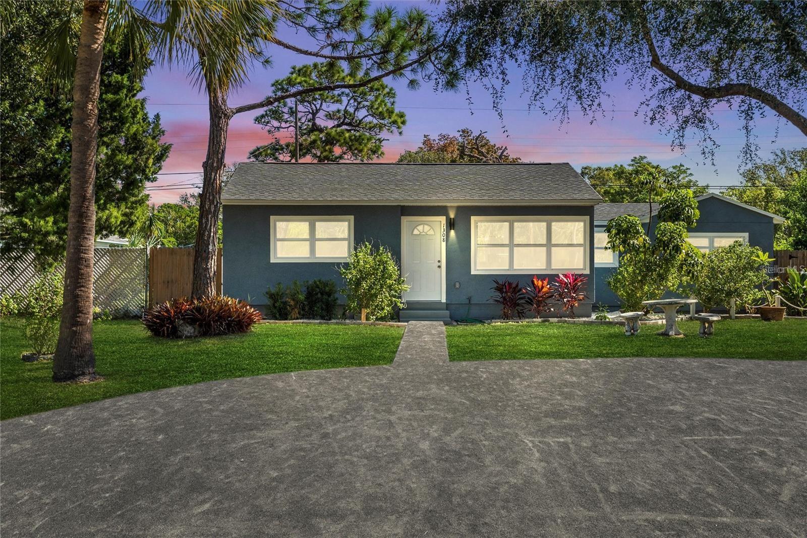 Fully renovated 3-bedroom, 2-bath Gulfport home with thoughtful updates throughout and a split floor plan that gives the primary suite real separation from the rest of the house. The open living, dining, and kitchen layout flows naturally for everyday life and easy entertaining with  shaker cabinets, granite counters, a tiled island with breakfast bar, blue glass tile backsplash, and stainless steel appliances making the kitchen the clear centerpiece of the home. The primary suite includes a walk-in closet and a private en-suite with dual vanities, stone counters, and a walk-in shower with floor-to-ceiling subway tile. The second bathroom is equally well-finished with a tub/shower combo and matching  fixtures. The bonus room off the secondary bedrooms works well as a dedicated home office, reading nook, or flex space. A full-size washer and dryer are included and located in the interior of the home. Every window has been fitted with blinds. The covered back entry with a new awning leads to an oversized, fully fenced backyard — plenty of room for a pool, a garden, outdoor entertaining, or storing recreational equipment. A large storage shed and alley-accessed detached garage provide additional covered parking and storage. Bring your RV, boat, trailer or work truck as the neighborhood does not restrict this and you have easy access with the double gate off the alley. Major systems were all replaced in 2022 with permits: roof with hurricane clips, electrical panel and wiring, plumbing, HVAC with new ductwork, impact-resistant windows, and water heater. Flood Zone X — no flood insurance required. Located minutes from the shops, restaurants, and waterfront of Gulfport's Historic District. No HOA.