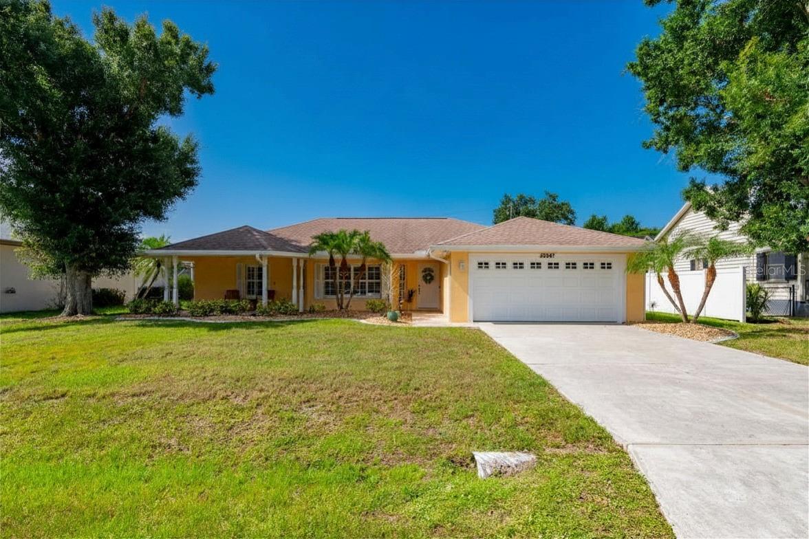 Move-In Ready Luxury in Section 15 — Port Charlotte | NO HOA, NO Deed Restrictions
Some homes simply feel different the moment you walk in — this is one of them. This meticulously maintained 3-bedroom, 2-bath, 1,727 sq ft split-floor-plan home reflects a thoughtfully curated collection of upgrades and updates, and it shows in every detail.
A neutral palette of soft, sophisticated tones flows throughout, setting the stage for luxury vinyl flooring, plantation shutters, and soaring vaulted ceilings that give the main living spaces an airy, elevated feel. The kitchen is the true showstopper — rich quartzite countertops, crisp white cabinetry, and generous space to prep, cook, and gather make it as functional as it is beautiful. The eat-in dining area flows effortlessly into a spacious great room, where an electric fireplace and custom built-in shelving create a warm, designer-curated spot to unwind.
The primary suite is a private retreat, anchored by a generous walk-in closet and a fully renovated en suite bath featuring a sleek walk-in shower and dual sinks. Two additional guest bedrooms are split to the opposite side of the home, offering privacy for family or visitors.
French doors lead out to a pavered, screened lanai overlooking lush, mature tropical landscaping — the perfect backdrop for morning coffee or evening wind-down. The fully fenced backyard offers plenty of room to add a pool down the road, and the oversized 2-car garage with epoxy flooring delivers extra space for storage, hobbies, or projects.
For true peace of mind, this home is outfitted with a newer roof (2022), newer A/C (2021), and Kevlar hurricane protection on all windows and doors — premium upgrades that blend seamlessly with the home's clean, refined aesthetic.
Beyond the home, life in Section 15 of Port Charlotte means easy access to charming dining and boutiques, farmers markets and festivals, golf, fishing, boat ramps, sun-soaked beaches, spring training baseball games, Punta Gorda Airport, and the vibrant energy of downtown Punta Gorda.
This is more than a home — it's an upgrade in lifestyle. Schedule your private showing today.