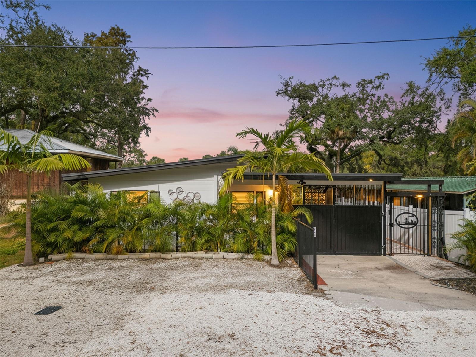 Welcome to 308 E. Hollywood Street, where timeless Seminole Heights charm meets modern comfort in one of Tampa's most desirable historic neighborhoods. Thoughtfully updated while maintaining its inviting character, this beautifully renovated home offers the perfect blend of style, functionality, and convenience. Step inside to discover a light-filled interior featuring an open and welcoming floor plan, luxury finishes, and tasteful upgrades throughout. The spacious living area flows seamlessly into the updated kitchen, complete with modern cabinetry, stone countertops, stainless steel appliances, and ample storage, creating the perfect space for both everyday living and entertaining. The generously sized bedrooms provide comfortable retreats, while the renovated bathroom showcases contemporary finishes and designer touches. Large windows throughout the home fill each room with natural light, enhancing the warm and inviting atmosphere. Outside, you'll find an oversized lot offering endless possibilities. Whether you envision creating your dream backyard oasis, adding a pool, expanding the home, or simply enjoying the generous green space, this property provides the flexibility to make it your own. Ideally situated in the heart of Old Seminole Heights, you'll enjoy being just minutes from some of Tampa's favorite local restaurants, breweries, coffee shops, parks, the Hillsborough River, Downtown Tampa, Armature Works, and the Riverwalk. With convenient access to I-275, commuting throughout the Tampa Bay area is effortless. Whether you're searching for your first home, a move-in-ready residence, or an investment opportunity in one of Tampa's fastest-growing neighborhoods, 308 E. Hollywood Street offers exceptional value, modern updates, and an unbeatable location.