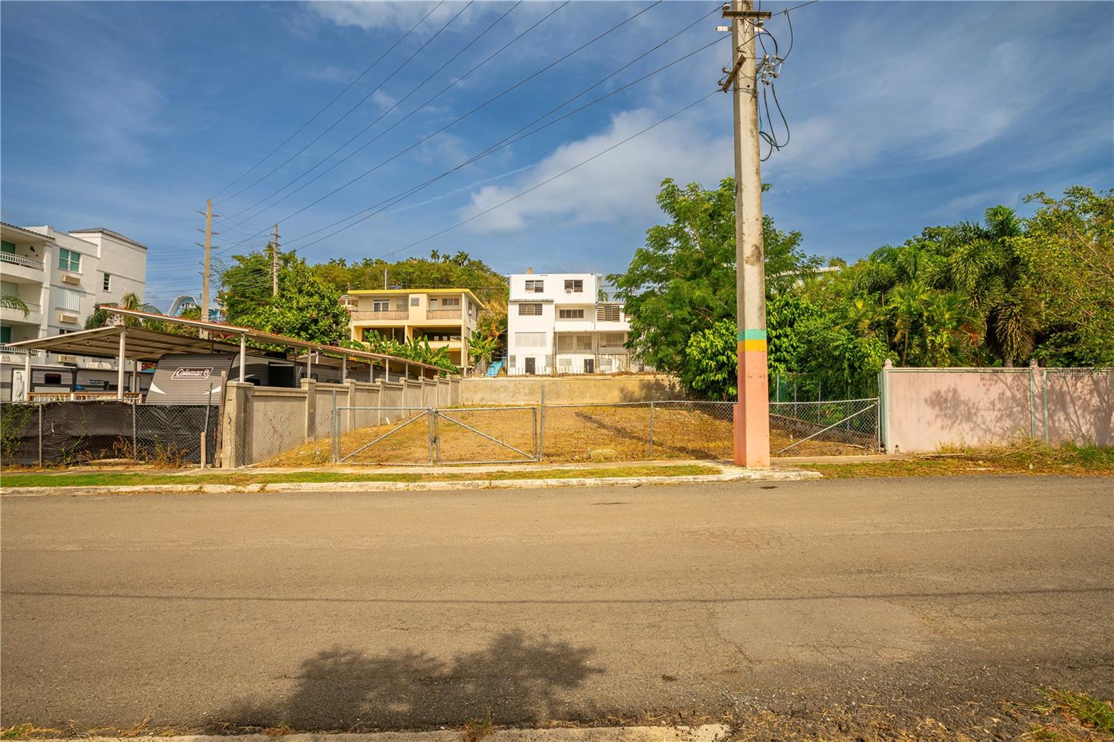 Location, location, location. Buildable 439.738 sq meter lot in the heart of Rincón, PR, offered at $369,900.00. Property features ocean views, a decorative concrete privacy wall, and utilities at the street. Approx. 1,090 sq ft buildable area, ideal for a 2,000+ sq ft residence or potential condos/apartments (buyer to verify). Plenty of off-street parking. Prime location—5-minute walk to town plaza, beaches, dining, Artwalk, Farmer's Market on Sunday and shopping. Excellent opportunity for residential or investment development.  Buildable points are in.   OGPe approved survey provided with the sale.  Coordinates: 18.3421304, -67.2536136.  Call for an appointment,  Don't miss out.  

Solar edificable de 439.738 metros cuadrados en el corazón de Rincón, PR, ofrecido en $369,900.00.  La propiedad cuenta con vistas al mar, pared perimetral decorativa de concreto y servicios públicos disponibles en la calle. Área edificable aproximada de 1,090 pies cuadrados, ideal para una residencia de 2,000+ pies cuadrados o para posible desarrollo de condominios/apartamentos (comprador debe verificar). Amplio estacionamiento fuera en la calle. Ubicación privilegiada a 5 minutos caminando de la plaza del pueblo, playas, restaurantes, el Artwalk, el Mercado de Agricultores y comercios. Excelente oportunidad para desarrollo residencial o de inversión.  Tiene plano aprovado por OGPe.  Coordinadas: 18.3421304, -67.2536136.  Llamar/cita.  No te lo pierdes.