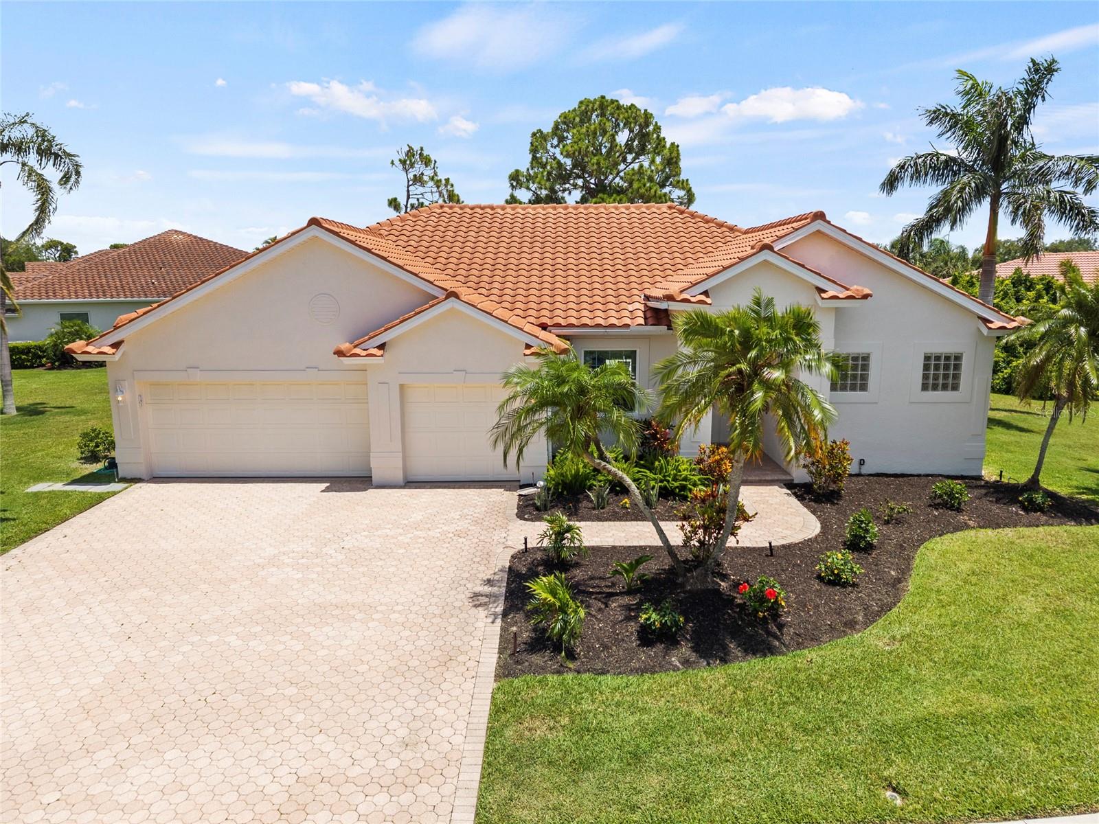 WONDERFUL OPPORTUNITY to own one of the most beautiful and largest homesite in the Estates of Stoneybrook Golf and Country Club. NOTICE HOA LIGHT $150 annually.  This true split plan home has 4 bedrooms and 3 full baths including a pool bath convenient for the forth bedroom a nice suite away the main bedroom areas.   You will love the vaulted ceilings in the family room kitchen combo lots of windows to catch the evening sunsets. Well maintained this home boasts a new roof 8/2022 and new A/C 10/2022. You do want to miss this home with this large Lucious green homesite and serene lake views no golf balls in this yard.  Stoneybrook Golf & Country Club offers a member-owned lifestyle just minutes from Siesta Key, shopping, and the Legacy Trail, with a redesigned 18-hole golf course (2024), clubhouse dining, Har-Tru tennis courts, fitness center, and resort-style pool and spa, ideally situated  between Downtown Sarasota and Downtown Venice.  A new shopping center is set to open later 2026 including a new WHOLE FOODS and TRADER JOES.  A 26 acre new park filled with shopping and dining in the COSTCO location.