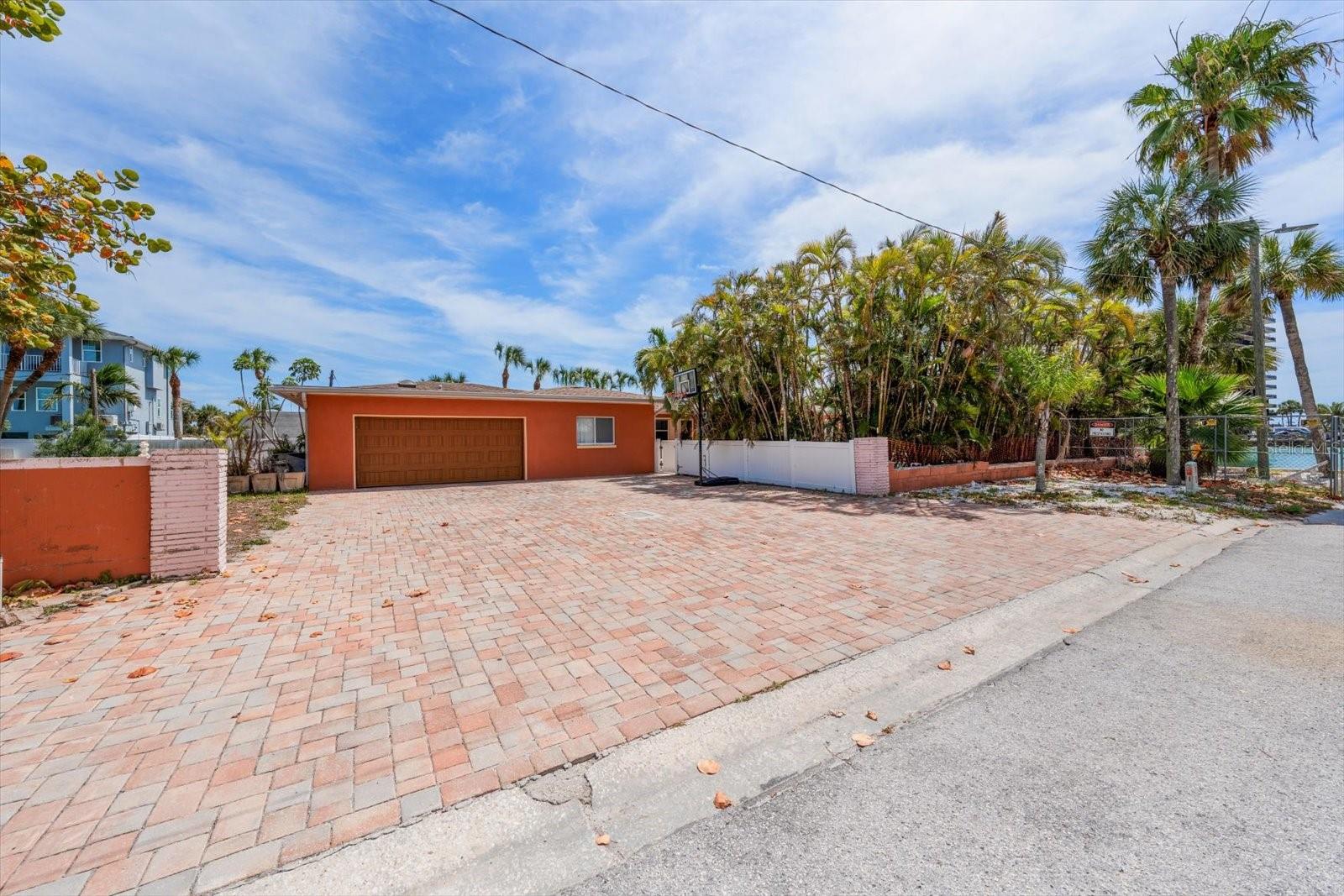 This home was water damaged by Hurricane Helene but has been remediated and dehumidified. Pinellas County deemed this property under 50% ( fifty percent) damaged so therefore it is qualified to remodel as it is or a new owner can "start from scratch" with their own vision while enjoying owning their own enclave in beautiful St. Pete Beach.  Please note, Solar Panels do not function in the manner for which they were designed.

This an opportunity to have a rarity in St. Pete Beach with 3 lots,  half an acre +/-, directly on Blind Pass with immediate access to the Gulf of Mexico!!!! This unique property offers a large dock for whatever you enjoy doing on the water, boating, jet skiing, paddle boarding or just " floating around ".

This information is not warranted by the Sellers or the Real Estate Brokers and therefore Buyers and Buyers Brokers should verify with City and County authorities.

All room sizes are approximate and should be verified by the Buyer.