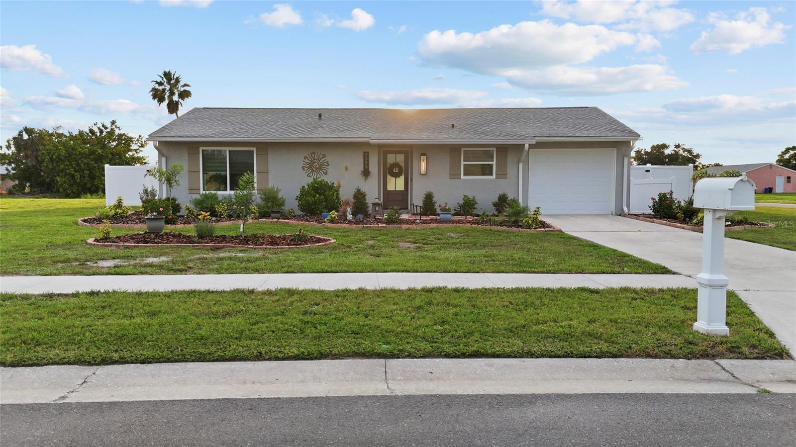 PRICED TO SELL — and packed with upgrades that will blow you away.

Welcome to your move-in ready Florida dream home, where every major improvement has already been done for you. Situated on an oversized corner lot with a 6-foot privacy fence and stunning backyard sunsets, this beautifully updated 3-bedroom, 2-bath home delivers exceptional value at an unbeatable price.

Curb appeal that stops traffic: All-new landscaping with landscape lighting, decorative shutters, new front entry door, updated exterior lighting, and fresh exterior paint make a lasting first impression the moment you arrive.

Inside, everything is done: Open floor plan with luxury vinyl plank flooring throughout, fresh interior paint, custom blinds, updated light fixtures, a custom shiplap accent wall, and abundant natural light.

A kitchen you’ll love: Granite countertops, stainless steel appliances (2022), ample cabinetry, and a spacious breakfast bar — perfect for casual dining and entertaining.

Primary suite & baths:The primary suite is a true retreat, complete with a beautifully updated en-suite bath featuring a walk-in shower.  The guest bath features a tub/shower combination with attractive finishes throughout.

Big-ticket items? Already replaced:
 Roof (2022)
A/C & Ductwork (2022)
Stainless Steel Appliances (2022)
Whole-House Impact Windows (2023)
Complete Home Repipe (2024)
Whole-House Surge Protector
Hurricane-Rated Garage Door w/ Bluetooth Camera,
Security System,
Fresh Interior & Exterior Paint. Flood insurance doesn't have to break the budget - a quote obtained on 6/5/26 was $1,592 per year.
Outside is where it truly shines: Spacious fenced backyard with room for pets, gardening, entertaining, or a future pool. Relax on the patio beneath the sunshade while taking in breathtaking Florida sunsets every single evening. No HOA — bring your boat, RV, or extra vehicles.

Location is a 10: Parks, walking trails, pickleball, tennis and basketball courts are all minutes away. Boating enthusiasts will appreciate the close proximity to Marina Park boat ramp, also located just a few minutes away.  Less than 15 minutes to Wellen Park and Downtown Wellen — waterfront dining, live entertainment, shopping, community events, and CoolToday Park (Atlanta Braves Spring Training).

Perfect as a primary residence, seasonal getaway, or investment property. At this price with these upgrades, this home will not last. Schedule your showing today.