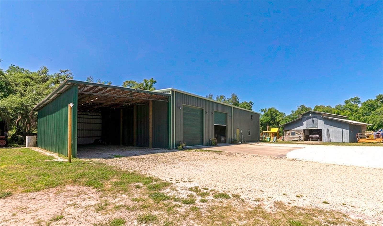 opportunity to own Old Florida homestead land. This property reflects the character of Florida's early agricultural roots. 
 oak Hammocks, Equestrian use, farming or future investment. Enjoy the privacy and natural beauty. The large metal building measures 
 at 50x80 2 bays and a 10,000 lb lift. Charming 2/2 apartment with spiral staircase. The walls are meticulously done in barn side wood. 
 16' ceiling. NO DEED RESTRICTIONS and NO HOA and its in flood zone x. Bring your horses 3 stall barn. this over 10-acre property in
 old Myakka is a rare find. Bring all your toys and critters. Just imagine ending your day with the sunset over your land, The quiet around
 you. This isn't just a property. It's a lifestyle waiting for you.