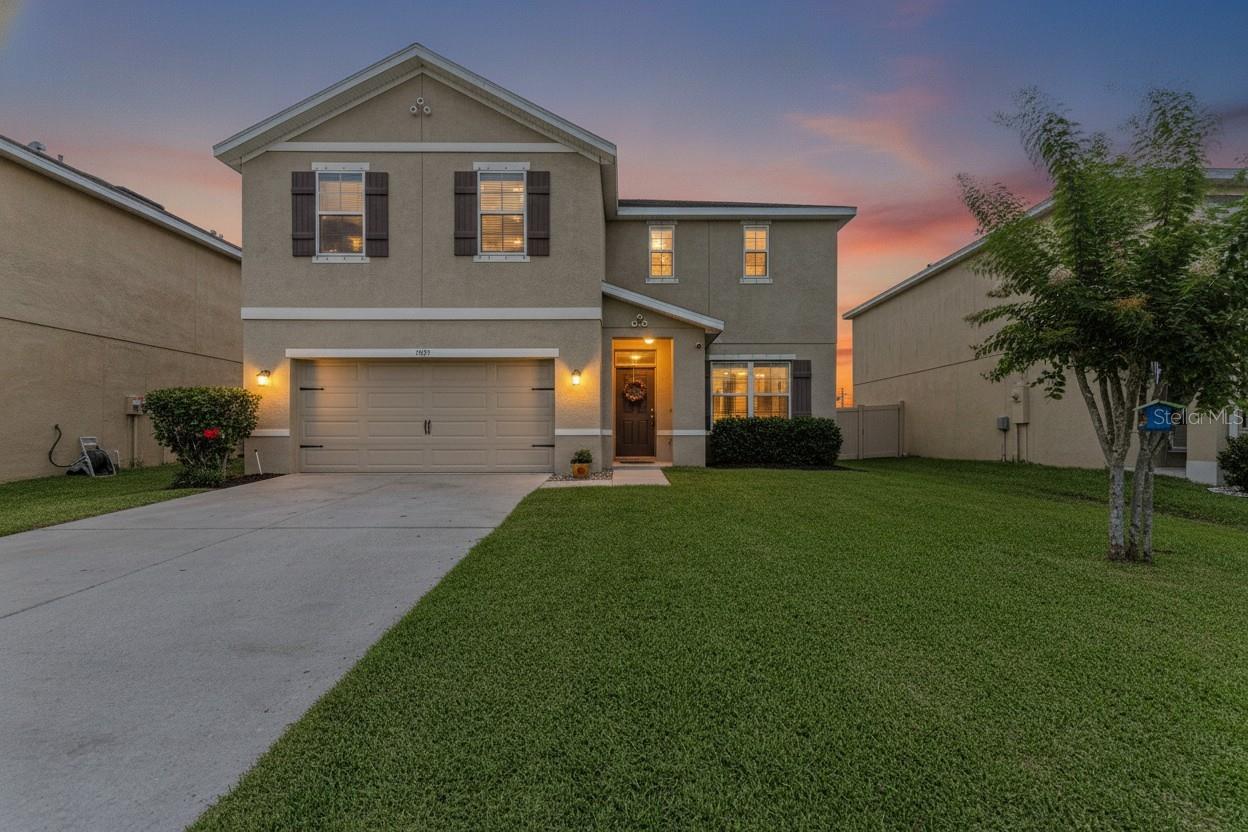 Move-in ready and packed with space, this beautifully maintained 4-bedroom, 2.5-bath home plus a flexible home office/flex space offers over 2,400 square feet of thoughtfully designed living space in the gated community of Villages at Glen Creek. With an open-concept floor plan, modern finishes, and a private fenced backyard, this home delivers space and functionality. Luxury vinyl plank flooring flows throughout the main living areas downstairs, while the spacious kitchen is designed for both everyday living and entertaining. Featuring granite countertops, a large center island, walk-in pantry, and plenty of cabinet and counter space, the kitchen overlooks the dining and large living room, creating a seamless gathering space for family and friends. Sliding glass doors open to the extended lanai and private fenced backyard, offering plenty of space to relax, entertain, or create the backyard oasis you've always wanted. With ample room to add a future pool, this outdoor space provides endless possibilities to customize your own piece of paradise. Upstairs, the massive owner's retreat offers a huge walk-in closet and an en-suite bath with dual vanities and a walk-in shower. Three additional bedrooms, a full bathroom, and a convenient upstairs laundry room provide plenty of space for family, guests, hobbies, or additional work-from-home flexibility. Storage is plentiful with under-stair storage, overhead garage storage racks, and extra storage throughout the home. The home is also wired for smart home technology for added convenience. Residents enjoy a gated entrance, resort-style community pool, playground, and walking trails. Even better, the low HOA fee includes both cable TV and high-speed fiber internet, adding exceptional value and helping keep monthly expenses predictable. Conveniently located near shopping, dining, medical facilities, parks, Downtown Bradenton, Lakewood Ranch, Sarasota, I-75, and the world-famous Gulf Coast beaches, including Anna Maria Island, this home offers the perfect combination of space, comfort, convenience, and Florida living.