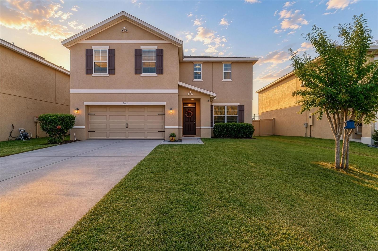 Move-in ready and packed with space, this beautifully maintained 4-bedroom, 2.5-bath home plus a flexible home office/flex space offers over 2,400 square feet of thoughtfully designed living space in the gated community of Villages at Glen Creek. With an open-concept floor plan, modern finishes, and a private fenced backyard, this home delivers space and functionality. Luxury vinyl plank flooring flows throughout the main living areas downstairs, while the spacious kitchen is designed for both everyday living and entertaining. Featuring granite countertops, a large center island, walk-in pantry, and plenty of cabinet and counter space, the kitchen overlooks the dining and large living room, creating a seamless gathering space for family and friends. Sliding glass doors open to the extended lanai and private fenced backyard, offering plenty of space to relax, entertain, or create the backyard oasis you've always wanted. With ample room to add a future pool, this outdoor space provides endless possibilities to customize your own piece of paradise. Upstairs, the massive owner's retreat offers a huge walk-in closet and an en-suite bath with dual vanities and a walk-in shower. Three additional bedrooms, a full bathroom, and a convenient upstairs laundry room provide plenty of space for family, guests, hobbies, or additional work-from-home flexibility. Storage is plentiful with under-stair storage, overhead garage storage racks, and extra storage throughout the home. The home is also wired for smart home technology for added convenience. Residents enjoy a gated entrance, resort-style community pool, playground, and walking trails. Even better, the low HOA fee includes both cable TV and high-speed fiber internet, adding exceptional value and helping keep monthly expenses predictable. Conveniently located near shopping, dining, medical facilities, parks, Downtown Bradenton, Lakewood Ranch, Sarasota, I-75, and the world-famous Gulf Coast beaches, including Anna Maria Island, this home offers the perfect combination of space, comfort, convenience, and Florida living.