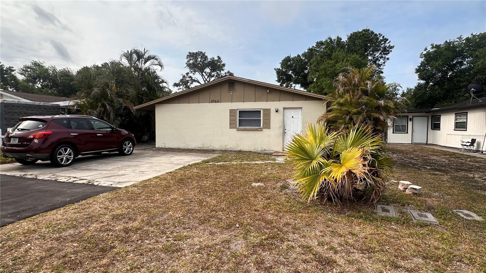 House Hack Opportunity! Live on one side and let the other pay your mortgage, all while Gulf beaches are just 10 minutes away. This block construction duplex in Largo's Coral Heights delivers income from day one. One unit is rented at $1,495 a month with tenants covering all utilities, and the other is delivered vacant, ready for an owner occupant or a new tenant at market rent. Each unit is a 2 bedroom, 1 bath with a living and dining combo, galley kitchen, and spacious bedrooms. Single level, low maintenance, and built to last. You are minutes from Indian Rocks Beach, Clearwater Beach, Ulmerton Road, I-275, great dining, and shopping. This is the kind of location tenants do not leave. Flood Zone X, no lender required flood insurance. Whether you are house hacking your way into Florida beach living or adding a solid income property to your portfolio, this one is worth a look. Schedule your showing today.